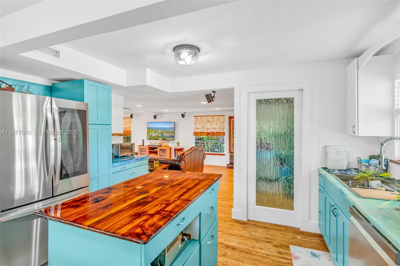 Spacious living room with panoramic views at 894 Ellen Dr - Luxury Home in Key Largo