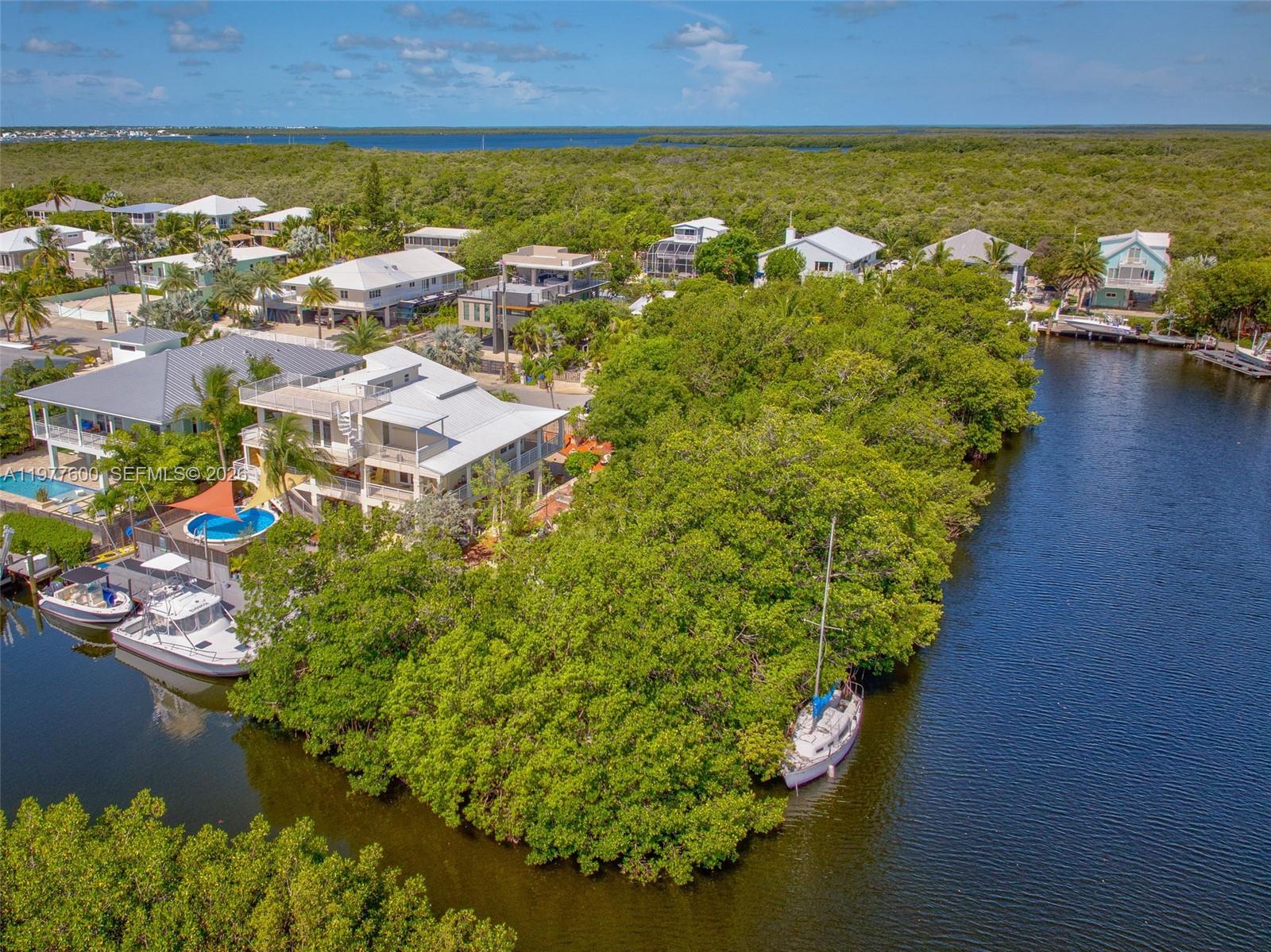 Waterfront views and dock access at 894 Ellen Dr - Luxury Home in Key Largo