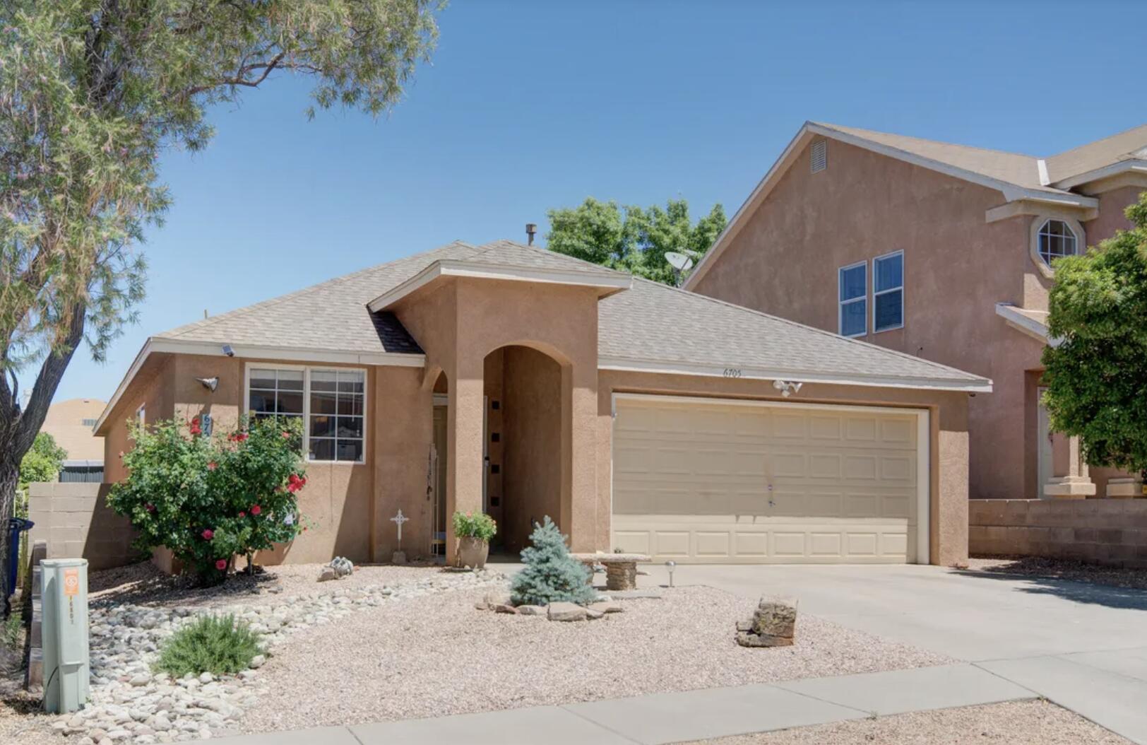 La Cueva District Investment Opportunity! Move-in ready NE Heights home with a tenant in place paying $3,300/month, offering immediate income potential. Located near shopping, dining, and quick freeway access, this well-maintained 3-bedroom, 2-bath home offers 1,679 sq ft of bright living space. The sunny front kitchen features new granite countertops and a cozy breakfast nook. The spacious family room includes a fireplace and clerestory windows for abundant natural light. Private primary suite with backyard access, double vanities, garden tub, separate shower, and mirrored walk-in closet. Enjoy the private walled backyard, low-maintenance landscaping, tool shed, and finished 2-car garage. Major upgrade: new AC & furnace (2025).