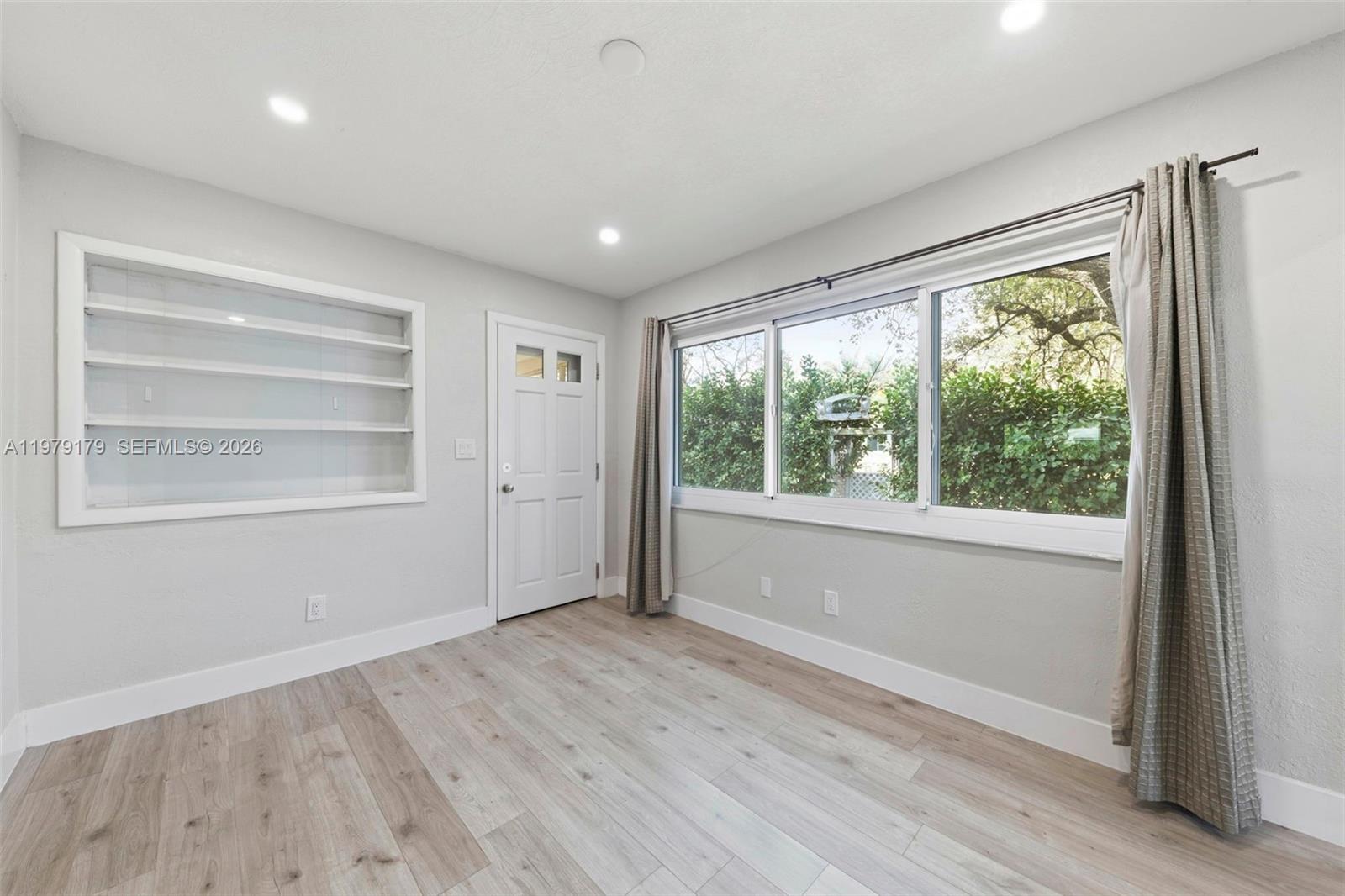 Open-concept living area at 4561 25th Ter - Home in Dania Beach