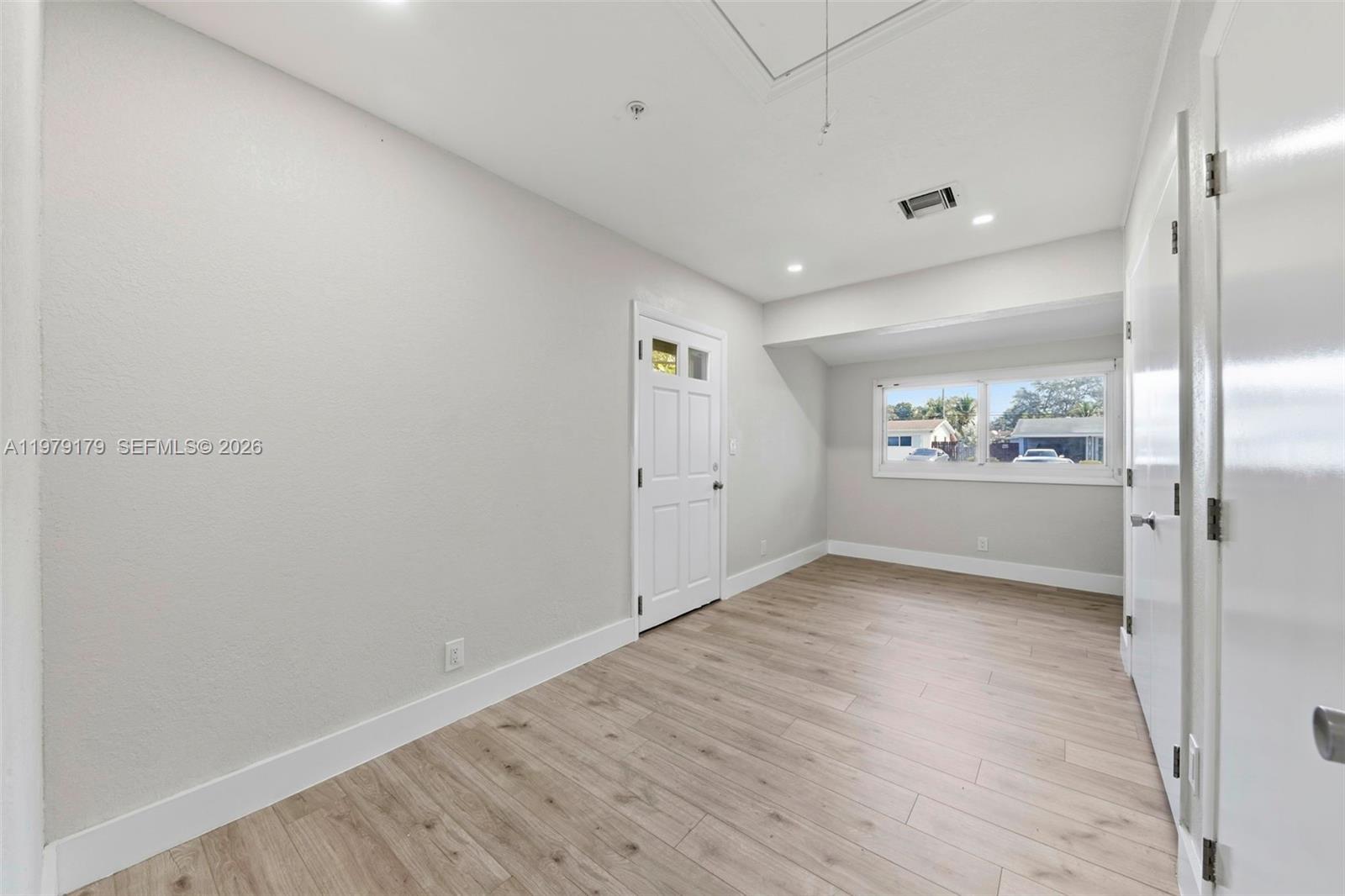 Well-appointed guest bedroom at 4561 25th Ter - Home in Dania Beach