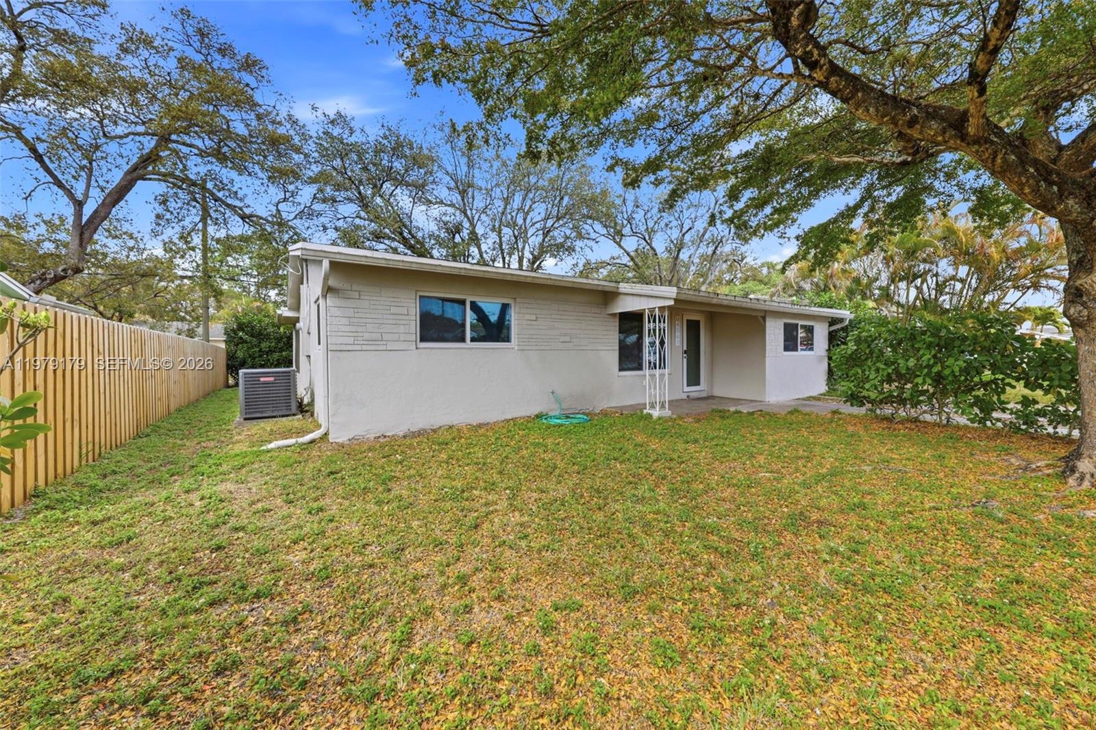 Open-concept living area at 4561 25th Ter - Home in Dania Beach