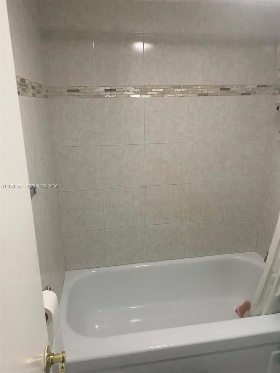 Designer master bathroom at 6010 Falls Cir Dr - Condo in Lauderhill