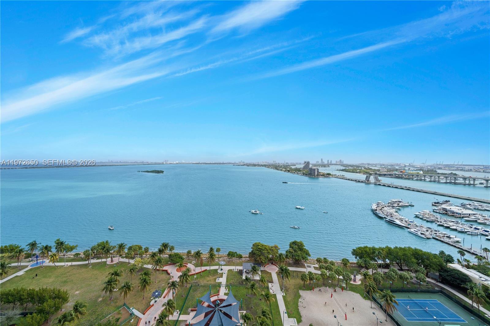 DIRECT BAYFRONT VIEWS FROM THE BEST LINE in ARIA ON THE BAY! Enjoy unobstructed views of Biscayne Bay and Margaret Pace Park from this spacious 3 bedroom / 4 bath + den home in the sky. Each room features an en-suite bath and access to the wrap around terrace with east and south exposure. Spacious kitchen opens directly to the dining & living area…all with direct water views. Den can be converted to a 4th room. The park at the water’s edge directly in front of this building is the only one of its kind in Edgewater and features tennis courts, sand volleyball, basketball, a dog park, picnic areas and a bayfront walking path. Several cafes, high end restaurants and supermarkets are along a radius of a few blocks. Conveniently located between the 2 main causeways into Miami Beach, less than 2 miles from Downtown, Wynwood & the Design District and just 6 miles from Miami International Airport. Building amenities include sunrise & sunset pools with expansive sun deck, spa with sauna, steam & massage rooms, gym + yoga studio, theater, teen lounge, children’s playroom, business center, social room with TVs & billiards tables, valet parking + 24 hr concierge. Exclusive FOB accessed elevator for this line. ONE OF THE BEST VALUES IN ALL OF MIAMI!