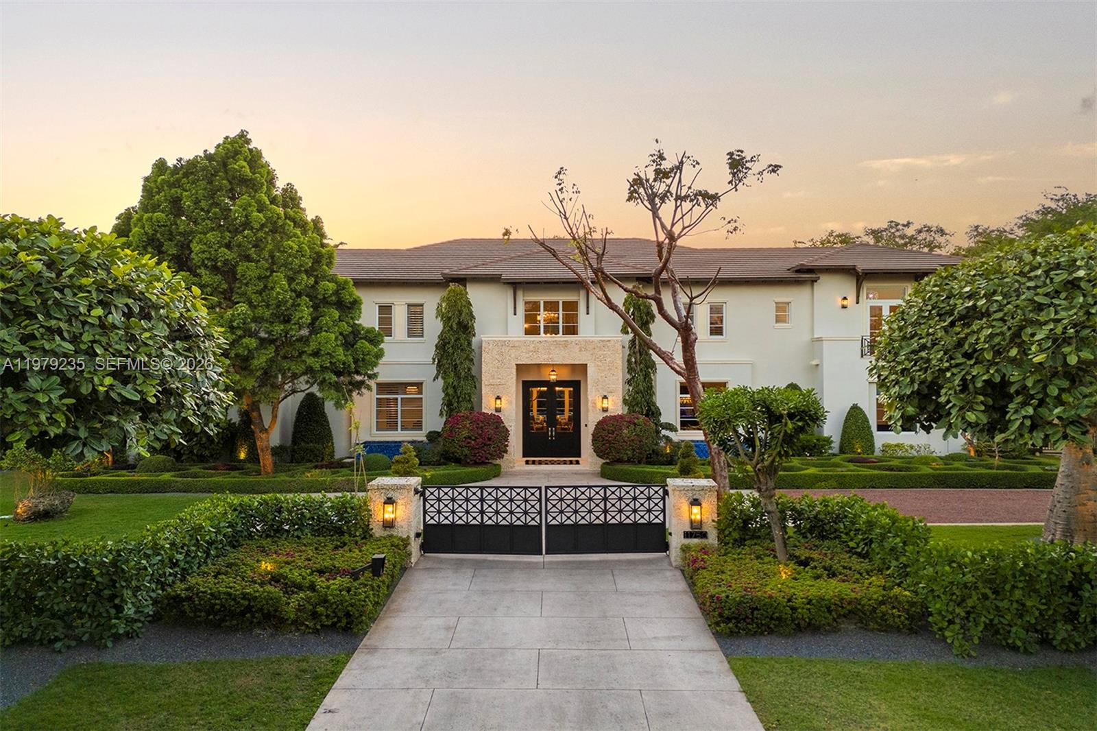 This custom-built two-story residence offers 6 bedrooms, 6 full baths, and 3 half baths with a spacious layout designed for both comfortable living and entertaining. The kitchen is set apart from the dining area and flows into generous gathering spaces, complemented by a wet bar, home office with access to a hidden custom wine cellar, movie room, exercise room, and additional entertainment areas. Upstairs features a secondary family room, grand primary suite, and three ensuite bedrooms. Beautifully maintained gardens frame the outdoor spaces with a pool and slide, water features, gazebo with summer kitchen, koi pond, mini-golf area, basketball court, and in-ground trampoline. Custom designed by renowned architect Ramon Pacheco and complete with a 3-car garage. Tenant occupied until May 14,2026.