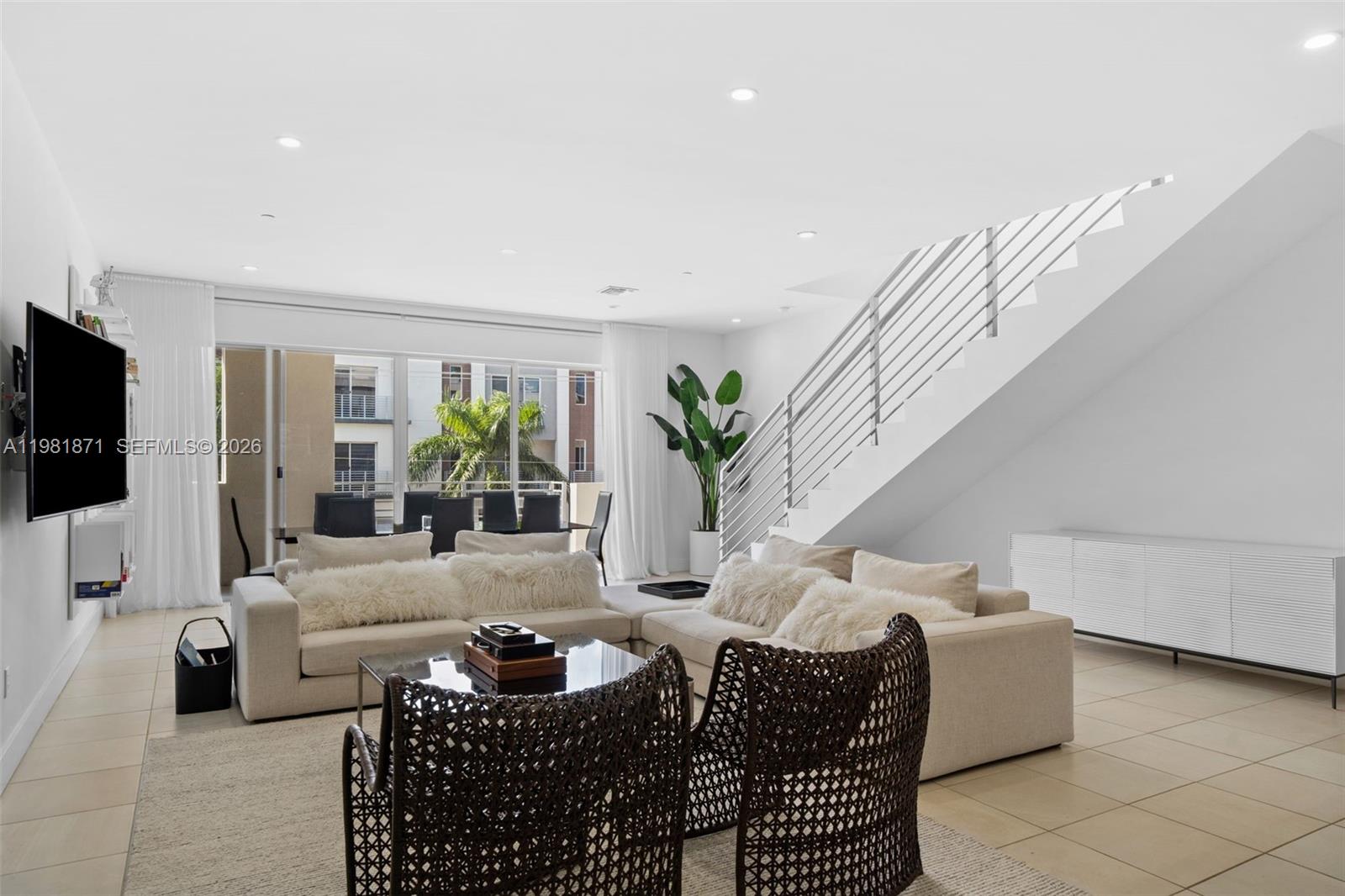 Modern 3-bedroom, 3.5-bath loft-style townhome in Galleria Lofts, located in the desirable Lake Ridge area of Fort Lauderdale. Spacious layout with approximately 1,938 sq ft of living space, high ceilings, open-concept living and dining area, and contemporary finishes throughout. Features include ceramic floors, covered and assigned parking, and abundant natural light. Conveniently located minutes from Fort Lauderdale Beach, The Galleria Mall, shopping, dining, and major highways. Ideal for buyers seeking modern design in a prime location.