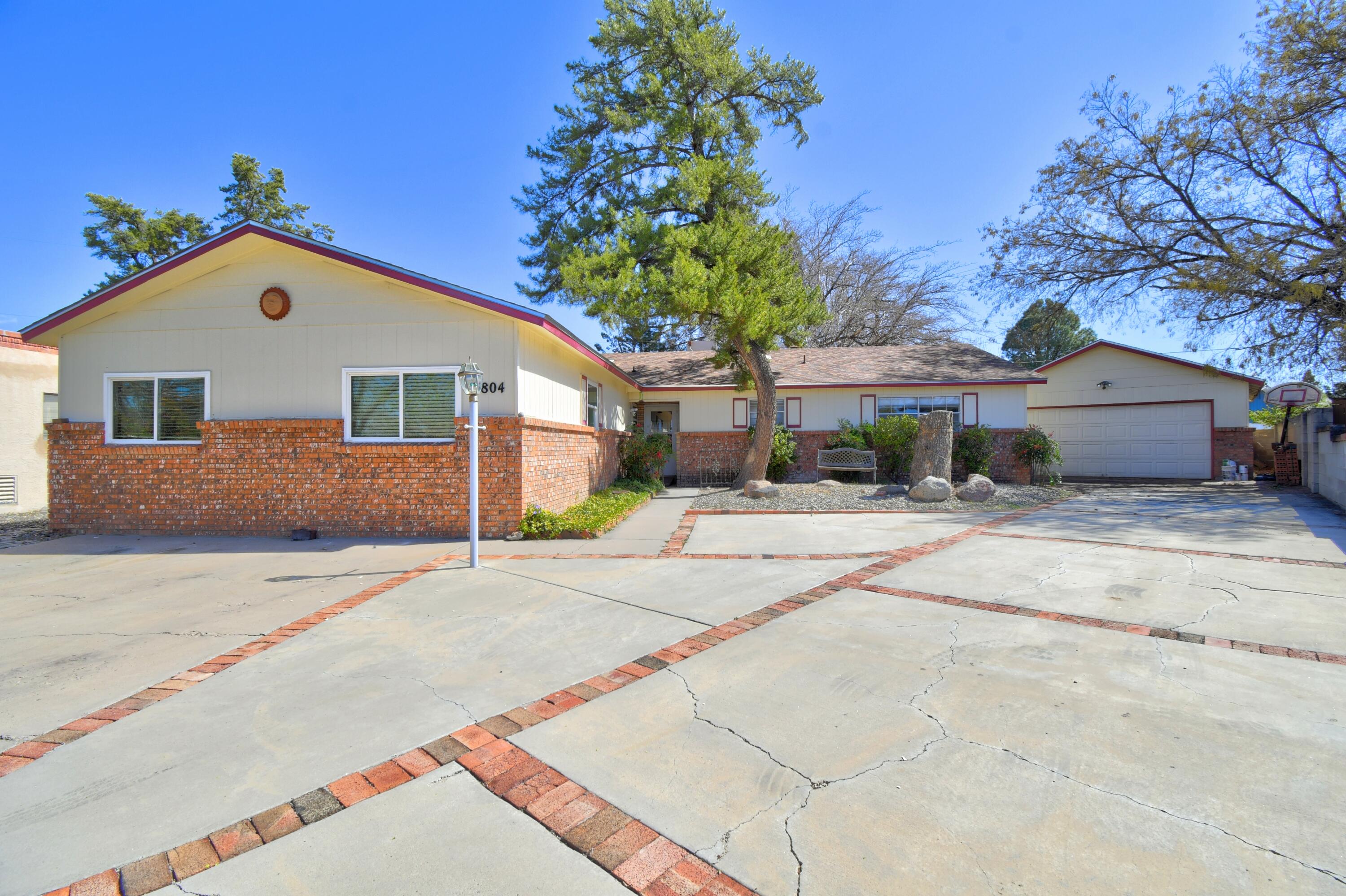 Nestled in a peaceful cul-de-sac, this delightful 4-bedroom, 3-bathroom home is perfect for families looking for comfort and convenience. One of the bedrooms can easily serve as a second living area, offering that extra space you've been dreaming of. With generous room sizes and a cozy fireplace in the family room, you'll find plenty of spots to unwind and create lasting memories. The detached two-car garage is a bonus, and the nearby shopping options make running errands a breeze. Come see how this home checks all the boxes! Roof was reshingled in 2019.