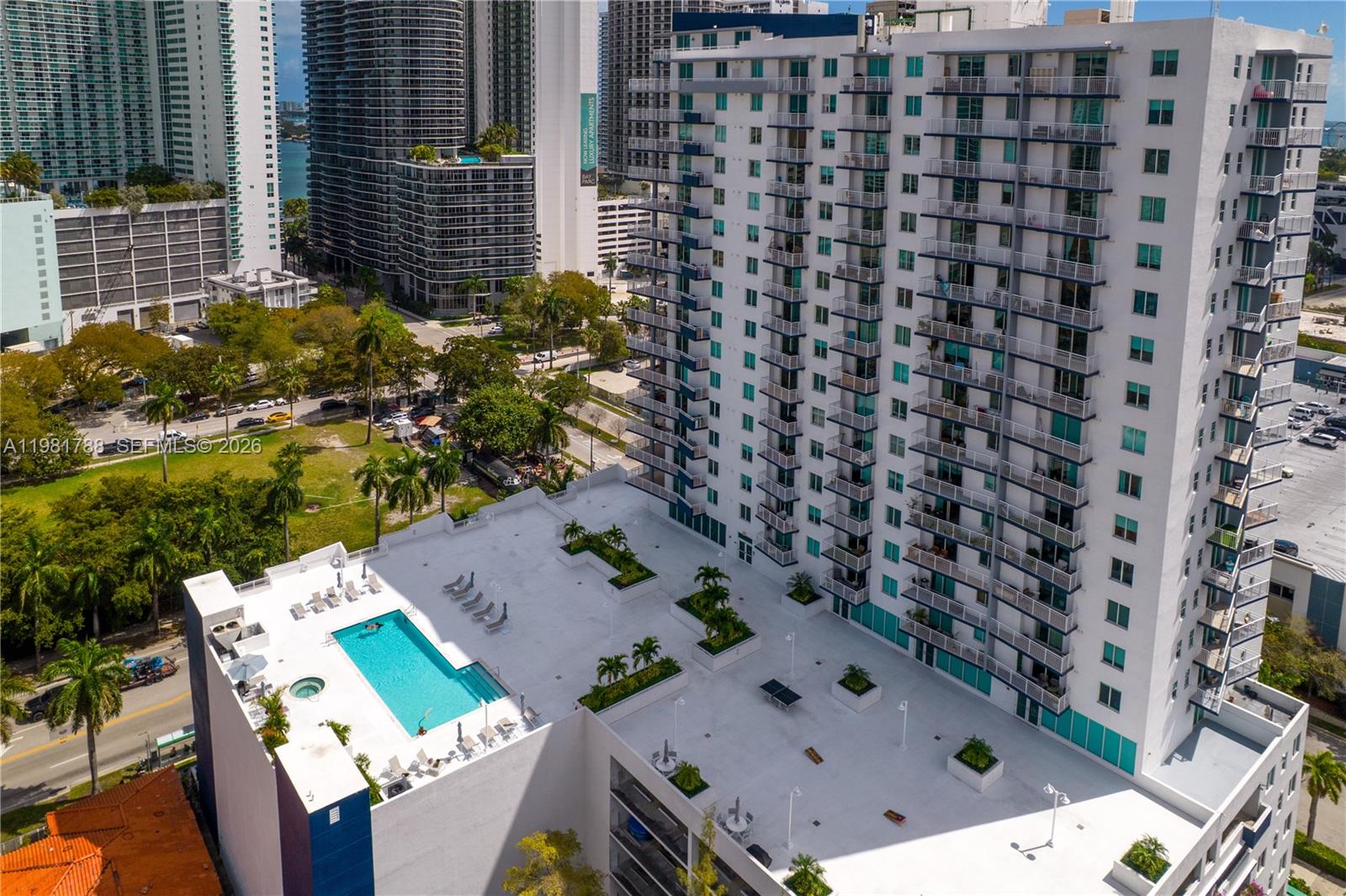 Spacious 3-bedroom, 2-bath residence located on the 8th floor at 275 NE 18th Street in Miami, offering over 1,300 square feet of living space. This well-appointed unit features two private balconies, including an expansive wraparound balcony with relaxing views of the pool and the beautiful Biscayne Bay—perfect for enjoying morning coffee or evening sunsets.The interior offers hardwood flooring, impact windows, and a desirable open layout filled with natural light. The primary suite includes a spacious walk-in closet, and the unit is equipped with the convenience of an in-unit washer and dryer.Residents enjoy easy access to Downtown Miami, Brickell, Wynwood, and the Design District, along with nearby waterfront parks, dining, shopping, and entertainment. A fantastic opportunity to enjoy comfortable living in one of Miami’s most sought-after neighborhoods.