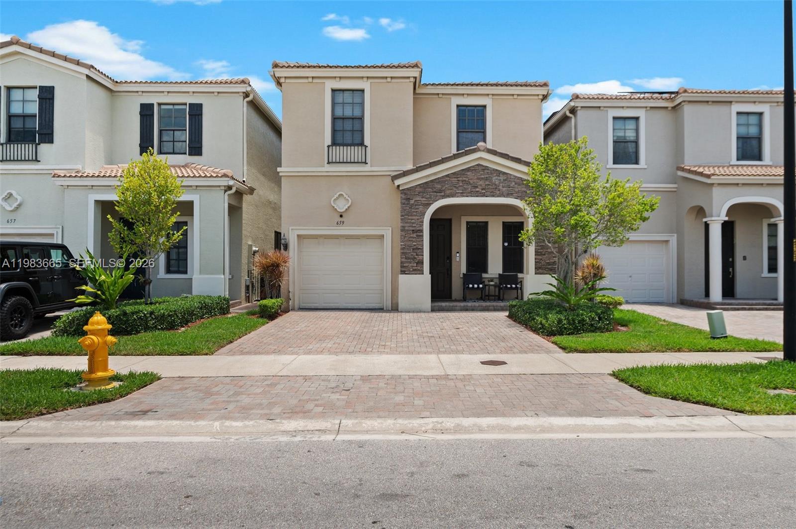 Experience the perfect bland of comfort, style, and convenience in this stunning 4BR/2.5BA home within the sought-after, guard-gated community of Champion Lakes. Within over 2,156 sqft of bright, open living space, this home is designed for effortless entertaining and everyday luxury. The gourmet kitchen-featuring granite countertops, stainless steel appliances, large pantry-flows seamlessly into the main living areas, creating a worm and inviting atmosphere. Upstairs, all four bedrooms provide exceptional space and privacy. Step outside to a fenced backyard, ideal for al-fresco dining or creating you own outdoor oasis with room for pool. Enjoy amenities, including pool, tennis courts, playgrounds, walking trails, and 24/7 security. The house is located on a same blockn as Aventura Chabad.