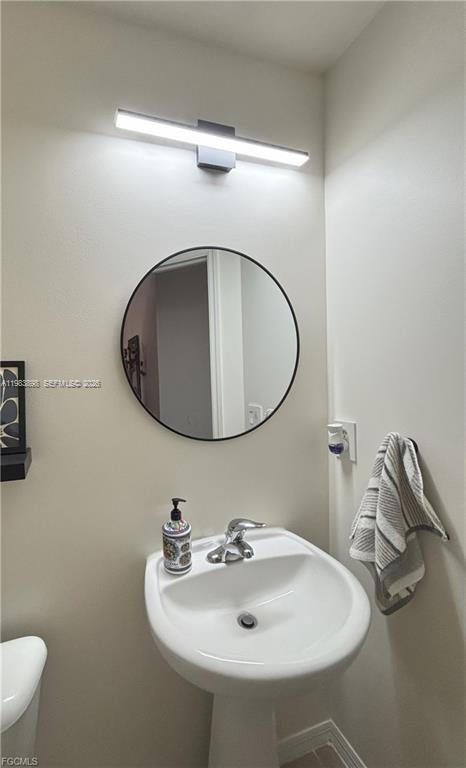 Designer master bathroom at 8042 Silver Birch Way - Home in Lehigh Acres