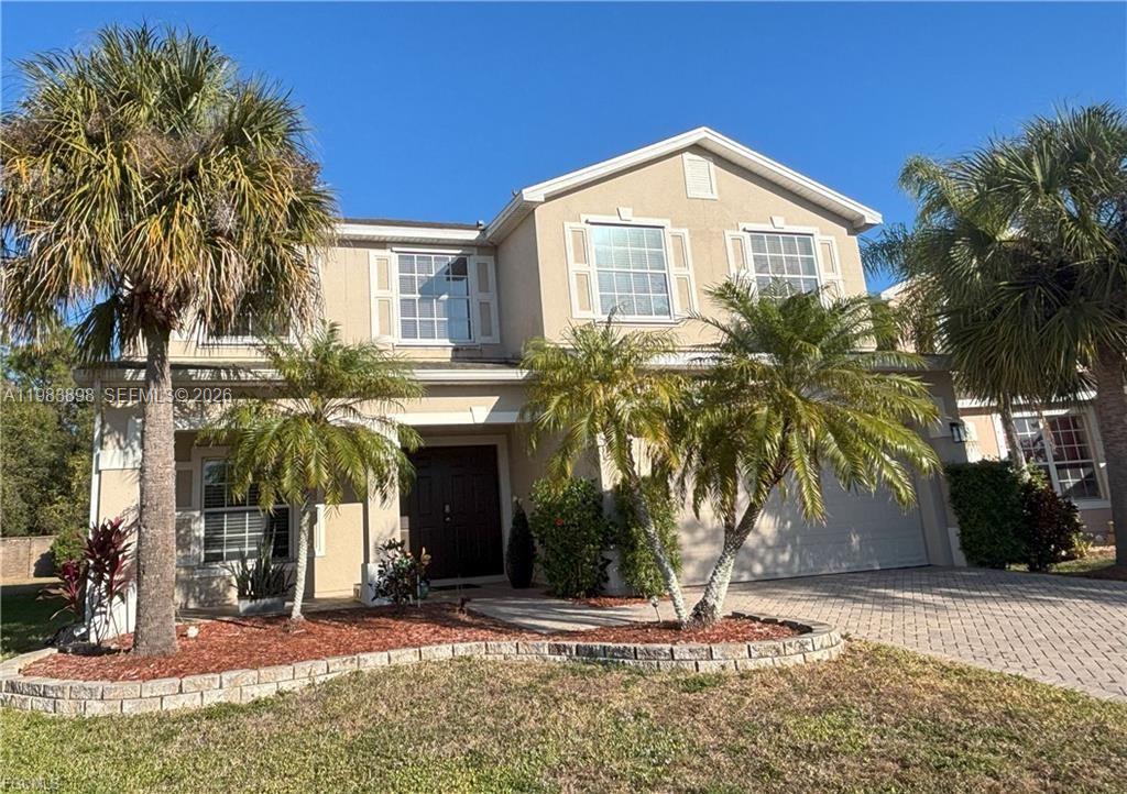 Open-concept living area at 8042 Silver Birch Way - Home in Lehigh Acres