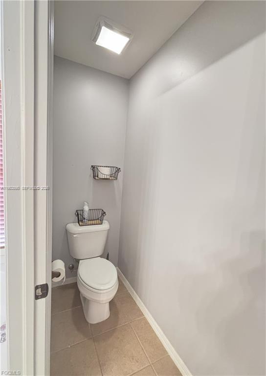 Open-concept living area at 8042 Silver Birch Way - Home in Lehigh Acres