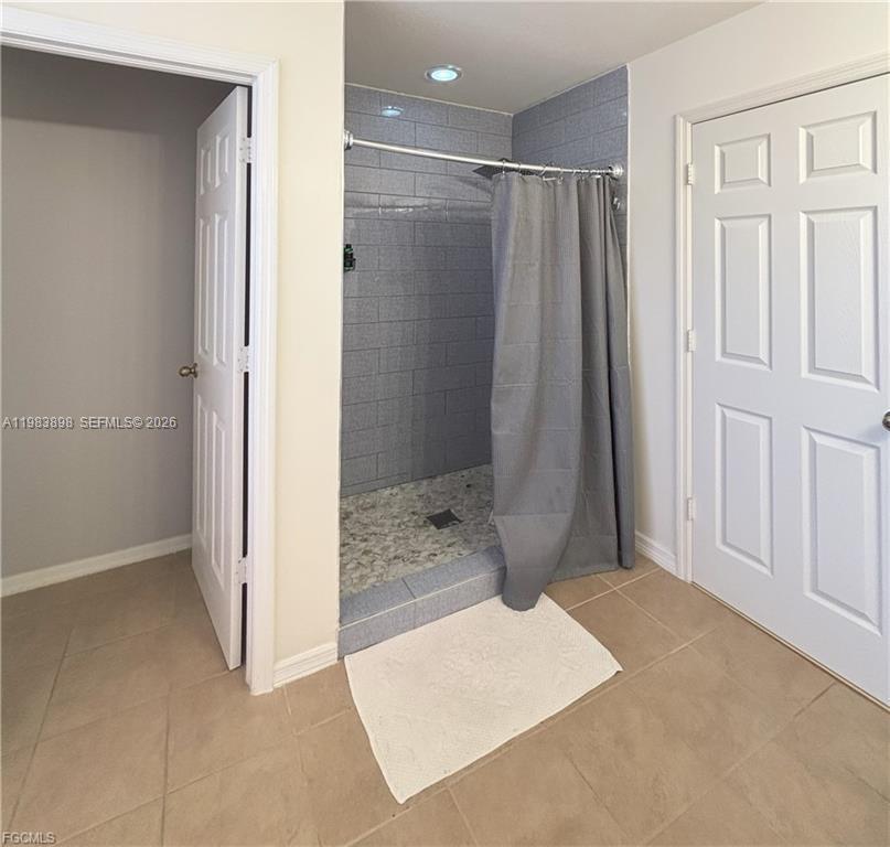 Modern kitchen with designer features at 8042 Silver Birch Way - Home in Lehigh Acres