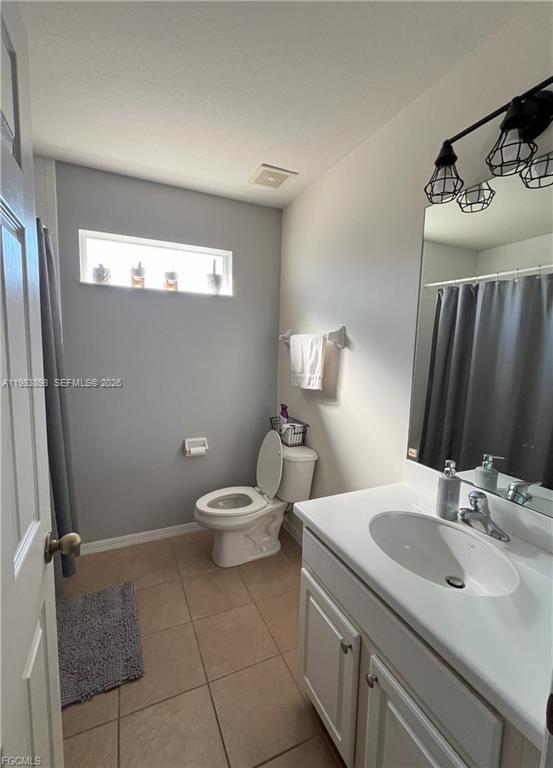 Well-appointed guest bedroom at 8042 Silver Birch Way - Home in Lehigh Acres