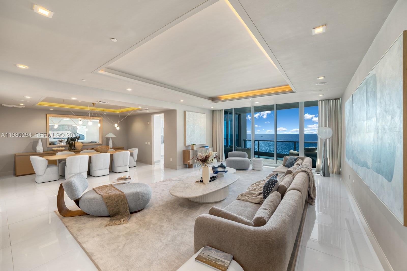 A spectacular residence in the sky at the iconic Bath Club. This beautifully renovated 4-bedroom, 5.5-bathroom home welcomes you through a private elevator entry into expansive living spaces totaling approximately 4,135 SF, where floor-to-ceiling glass frames breathtaking Atlantic Ocean views from the living areas, kitchen, and primary suite, along with tranquil bay vistas from the additional bedrooms. Elegant finishes include white Italian porcelain flooring, a designer kitchen with top-of-the-line appliances, and a fully integrated Control4 smart home system.The historic Bath Club, thoughtfully reimagined by renowned design duo Antrobus + Ramirez, blends timeless architecture with modern luxury. An agreement currently in progress provides residence owners with full Bath Club membership privileges, including dining at the Courtyard, Collins Room, and Omakase, pool and beach service, cultural events and member programs, preferred pricing for private events, and a House Account. Residents also enjoy concierge and valet service, owner’s lounge, children’s playroom, beach access, and fitness, spa, and tennis facilities shared with the residential tower, creating a truly exceptional Miami Beach lifestyle.