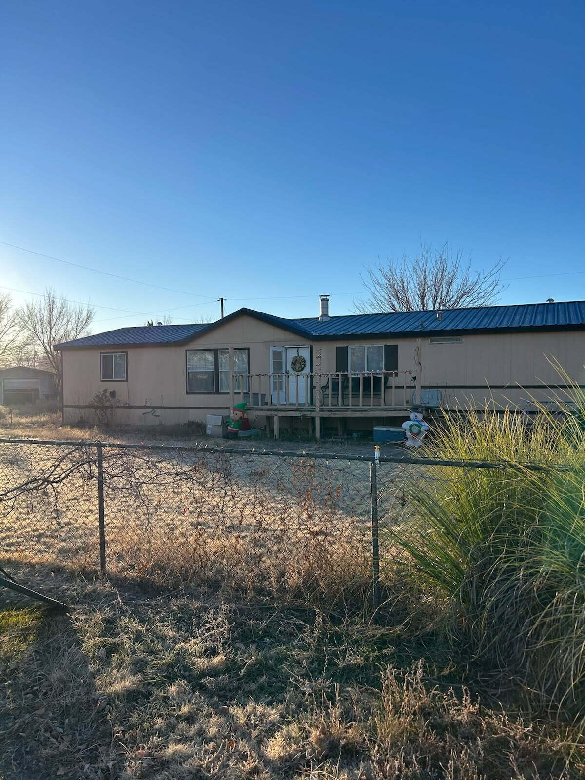 Welcome to Bosque Farms, a peaceful community where you can enjoy true country living. This spacious 4-bedroom home features a cozy wood stove, a brand-new roof, and plenty of room for your toys, gardens, and storage.Situated on a quiet, peaceful street, this property offers the space and freedom you've been looking for. Bring your animals and experience the comfort, charm, and luxury of rural living.
