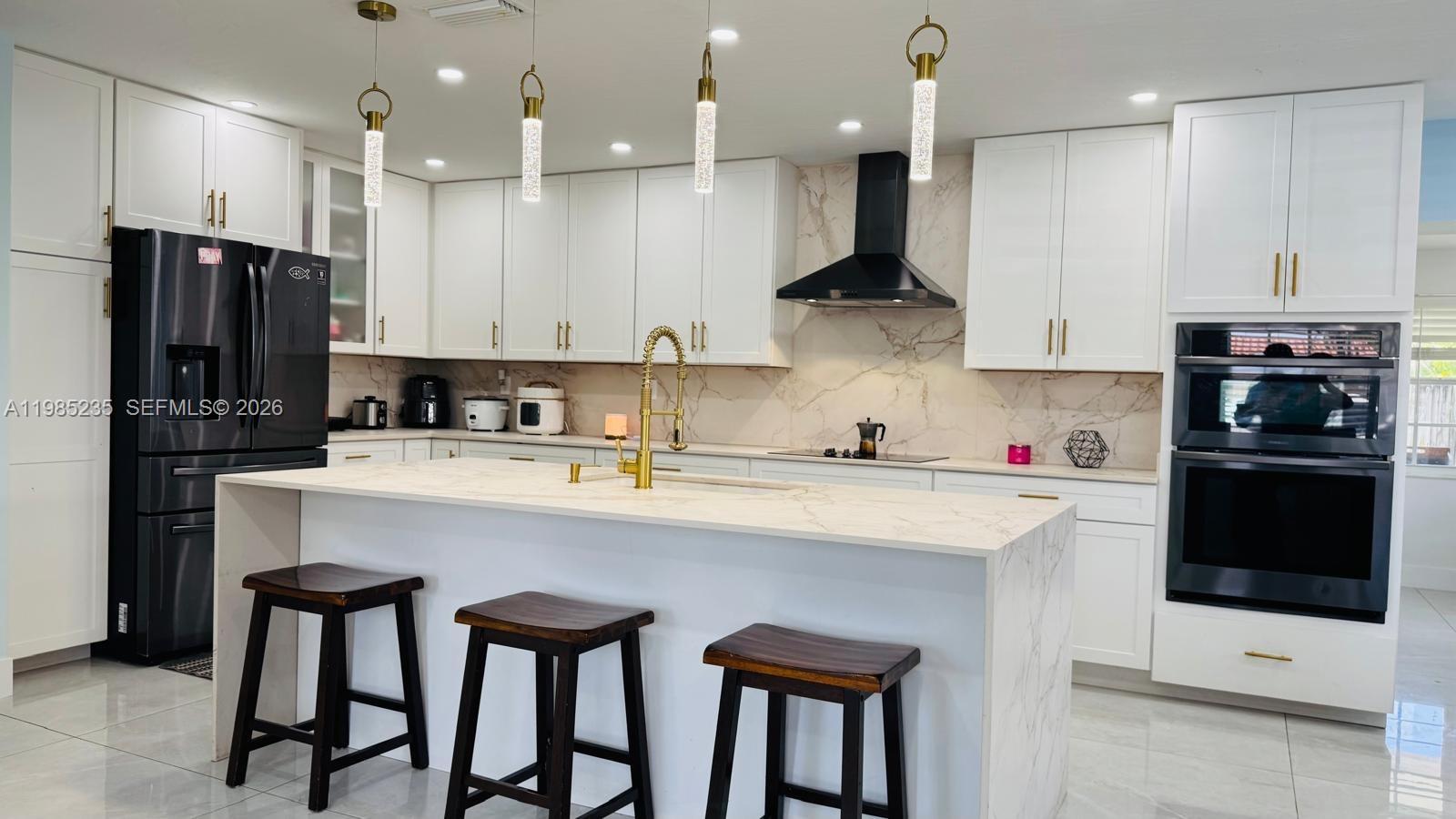 Location Location Location!!!!Complete open floor concept with a magnificent kitchen that would inspire you to cook, host and entertain family and friends. Side to side back terrace to enjoy Miami evenings while BBQ’ing.Newly remodeled less than two years including new plumbing system with PVC pipping no cast iron, two year old Titan hot water system as well.Great schools for your growing family. Come see this amazing home and all it has to offer for this magnificent price!Motivated seller, come ready to make an offer and move in just in time to get the kids enrolled in their new school’s.