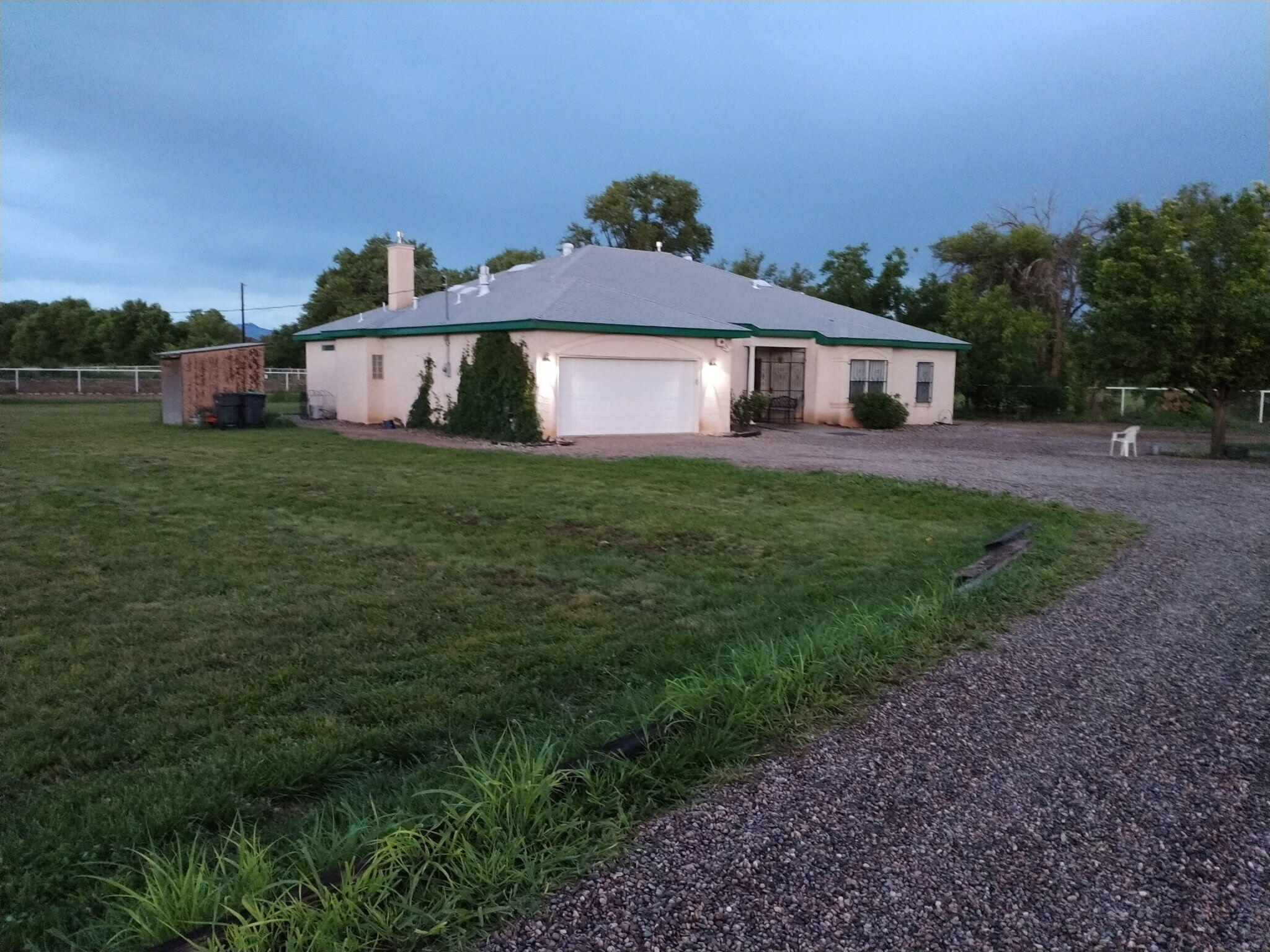 An amazing custom built home in the South Valley on 1.5 acres. Horses ok. A dream property off the main street. A hidden Jem.A blank slate to make your own.Refrigerated air in primary bedroom. Double sided fireplace in primary bedroom and bathroom along with large separate shower.  Fireplace in main living area. Tray ceilings in front room, dining room and primary bedroom. 10 ft ceilings, ceiling fans throughout home. Reverse osmosis set up on the utility sink for purified drinking water. Plank waterproof laminate throughout home. Peaceful, Quiet and Privacy, privacy, privacy!!!!There is so much to see and appreciate. Schedule your showing soon,  so you don't miss out on this amazing home!