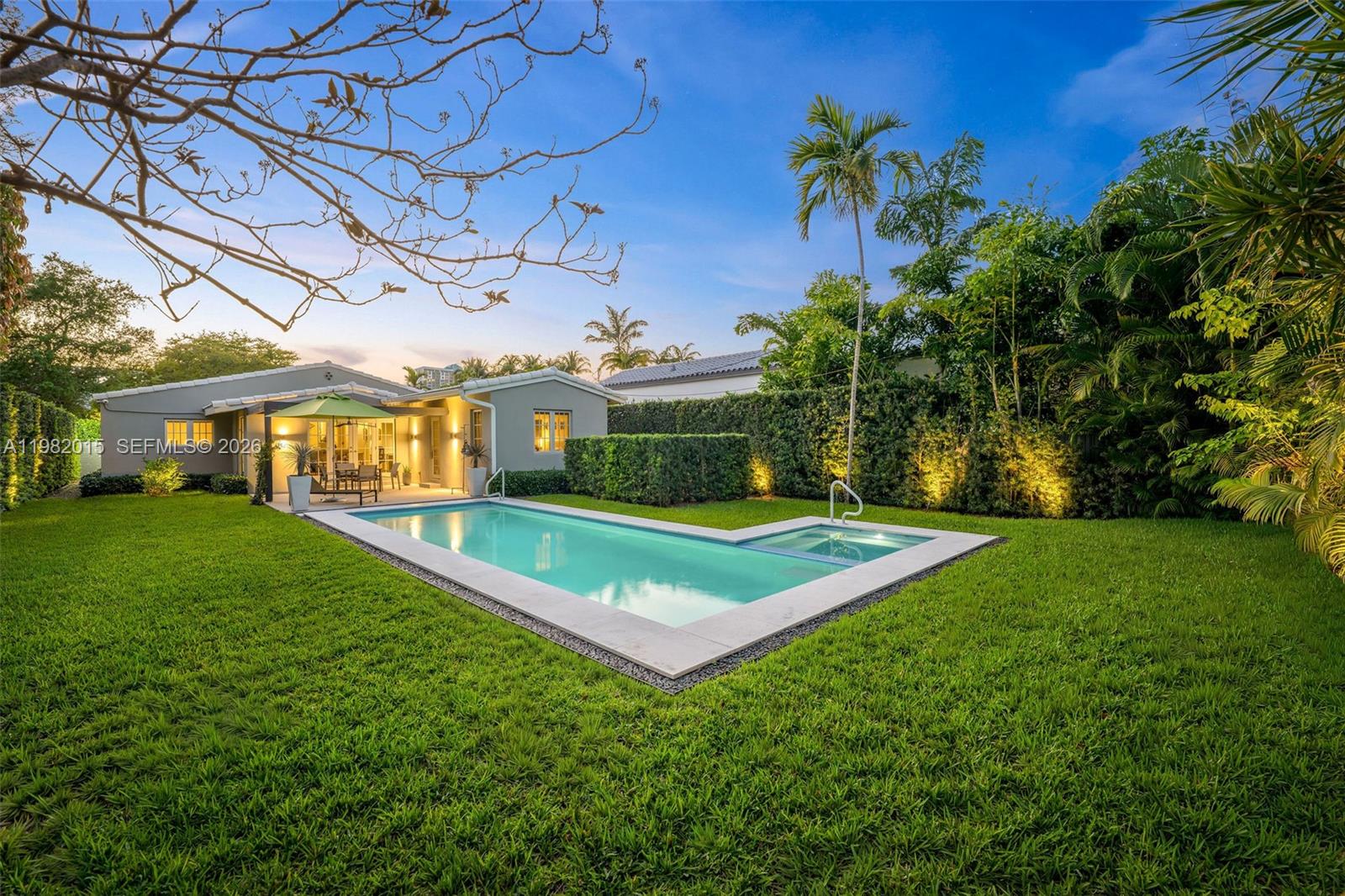 South Beach Deco Stunner! Renovated & ready residence set on an 8,000 Sq.Ft. lot. Minutes from the world-renowned Lincoln Road Mall, Convention Center, Miami Beach Botanical Garden, Sunset Harbour, New World Symphony, & Miami City Ballet. This home offers the perfect blend of tranquility & proximity to Miami Beach’s best dining, shopping, & entertainment, all in the coveted Palm View Neighborhood. Inside find soaring ceilings (almost 17' in great room) real wood French oak floors, & beautiful crown molding that highlight the home’s elegant Deco character. The thoughtfully updated eat-in kitchen features Bosch appliances, blending modern convenience with timeless style. Boasting Sonos throughout, a custom marble desk with built-in shelving, & period skylight updated with impact glass. Enjoy a thoughtfully designed split floor-plan, where the spacious primary suite occupies a private rear wing of the home, roomy dual closets & direct access to the backyard. Outdoors, the fully gated & walled yard has a heated saltwater lap pool & jacuzzi, framed by a 10' hedge & lush landscaping for total privacy. A pergola & patio create an inviting space for outdoor entertaining. This easy-living one-story offers a separate laundry room with sink, a garage with impact door & epoxy floor finishes, with direct access from the garage to the kitchen, & a gorgeous fireplace. Your chance to enjoy an exceptional Miami Beach Lifestyle. This home is everything you're looking for, no headaches here!