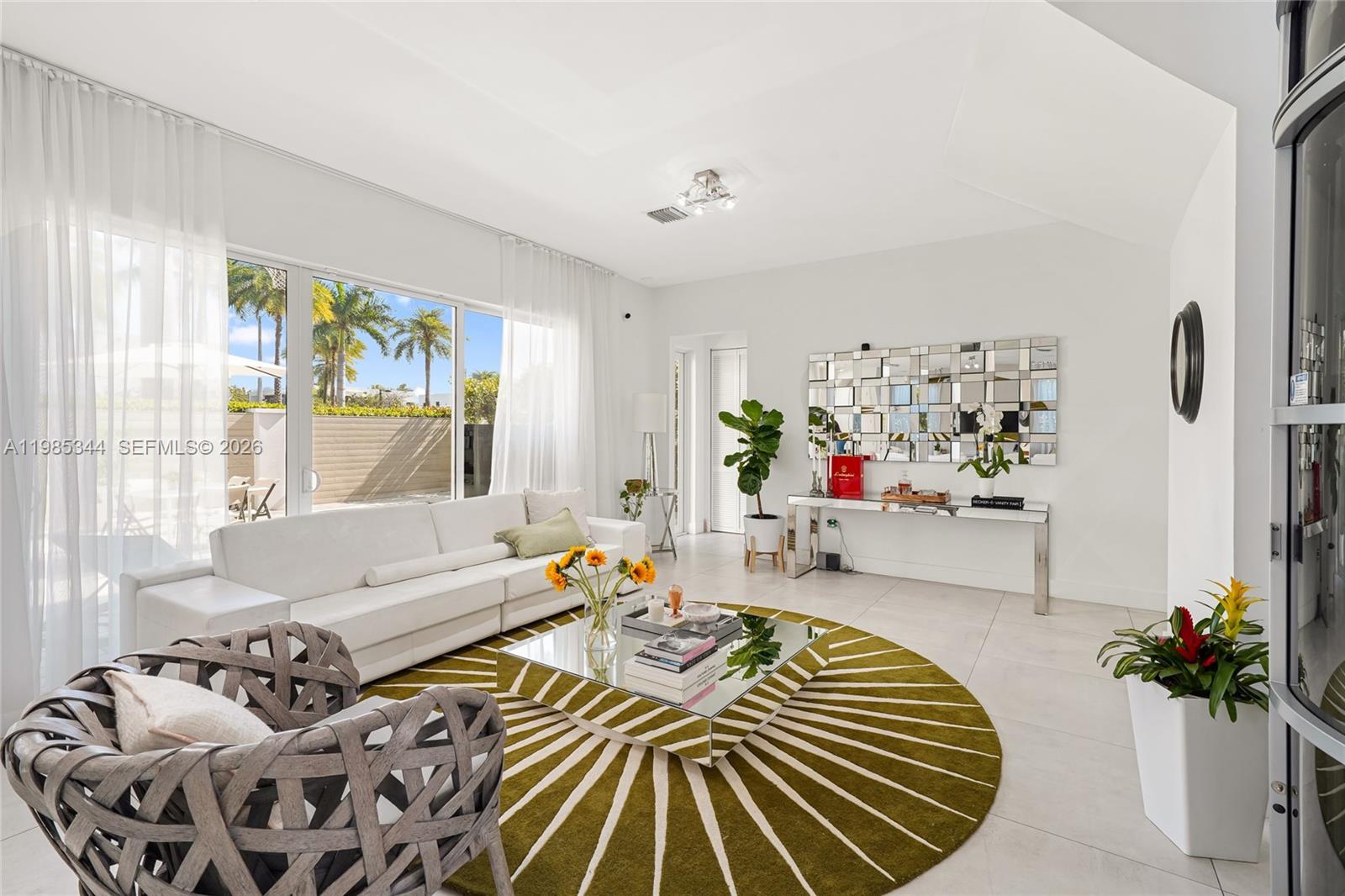 ICONIC LUXURY LIVING IN PRESTIGIOUS DORAL COMMONS! Step into a world of refined elegance and modern innovation in this showpiece estate, perfectly positioned on a prime corner lot in the highly coveted Doral Commons. Boasting 6 lavish bedrooms and 7 bathrooms, this residence delivers the ultimate blend of sophistication, comfort and resort-style living. Designed to impress, the home features a private elevator, salt water pool, 2 car garage and smart home technology including fingerprint entry and full Nest security system. Enjoy resort-style community amenities: gym, pool, hot tub, sauna, ping pong, boardroom and resident lounge. Steps from a public park with playground, basketball, volleyball, pickleball courts, walking trail and daycare. A rare turnkey opportunity in one of Doral's most sought-after communities. FULLY FURNISHED!!