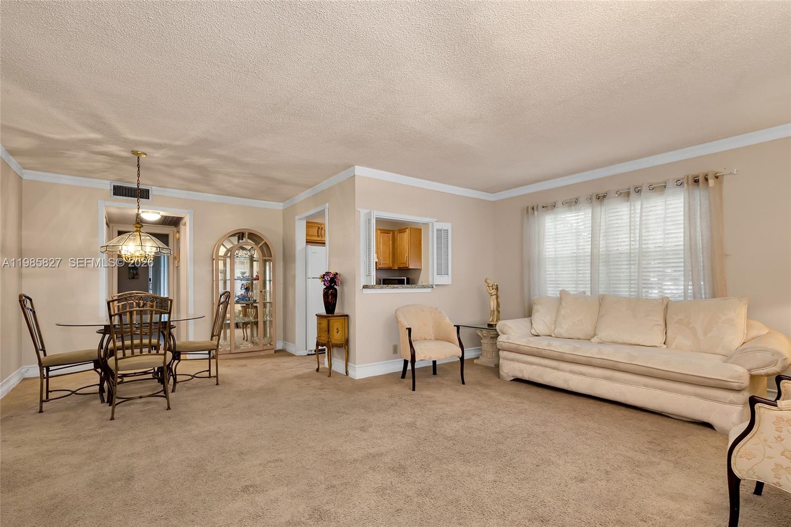 Open-concept living area at 418 Sheffield Q - Condo in West Palm Beach