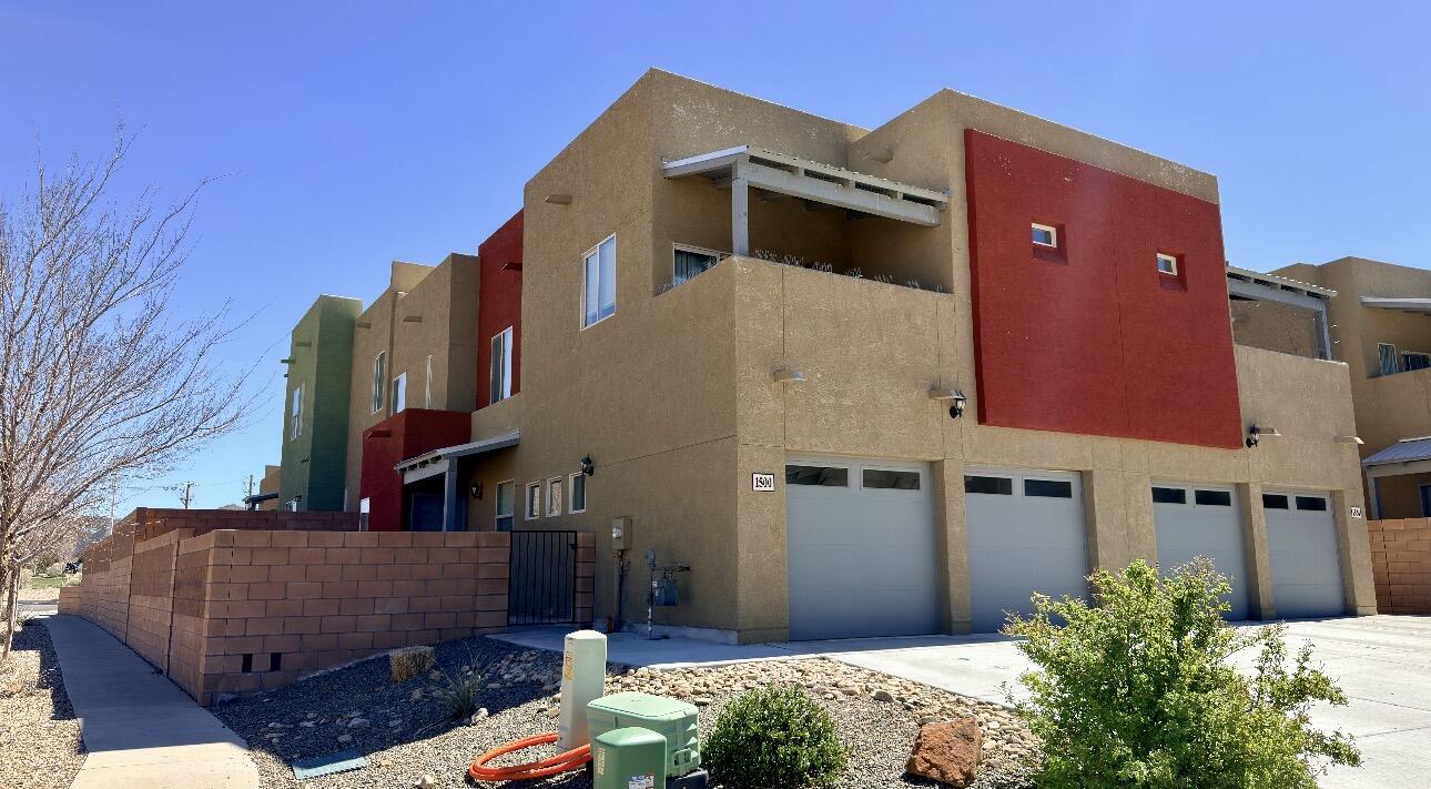 Beautiful new 3 bed/2.5 bath townhome featuring high-quality finishes throughout. The kitchen offers granite countertops, stainless steel appliances, and a breakfast bar that opens to the living and dining areas--perfect for entertaining. The spacious primary suite includes a walk-in closet, private patio access, and a bath with double sinks, soaking tub, and separate walk-in shower. Additional highlights include an attached two-car garage, covered porch, and fenced yard. Close to Kirtland Air Force Base, Sandia Labs, ABQ Uptown, and the Sandia Mountains.