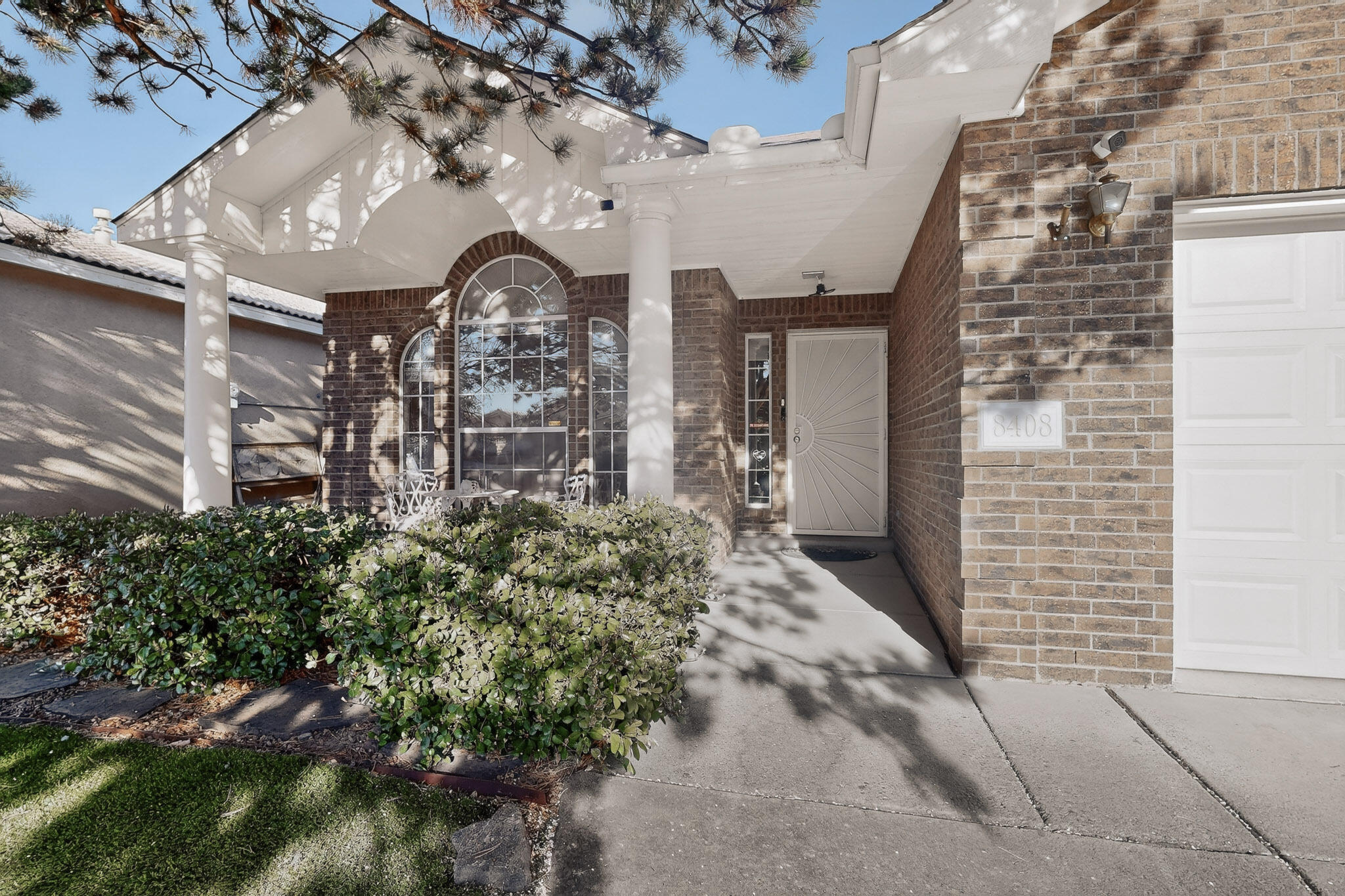 Ready for an offer! SOLAR SYSTEM will be PAID OFF at CLOSING! Come see this lovely all-brick home in the La Cueva School district. Boasting a functional floor plan & vaulted ceilings in the kitchen & living areas, this home offers a spacious, airy feel. The primary suite features double sinks, walk-in shower, & generous closet. This home has been freshly painted, has refrigerated air, & wood burning fireplace & the roof was recently maintained. Use the versatile front room with French doors as a formal dining space or quiet home office. Step outside to a beautiful backyard perfect for sunsets and BBQs. Located minutes from schools, shopping, dining, parks & Paseo & I-25. This home is clean, solid, & ready for your personal touch and ready for you to make it your own once you move in.