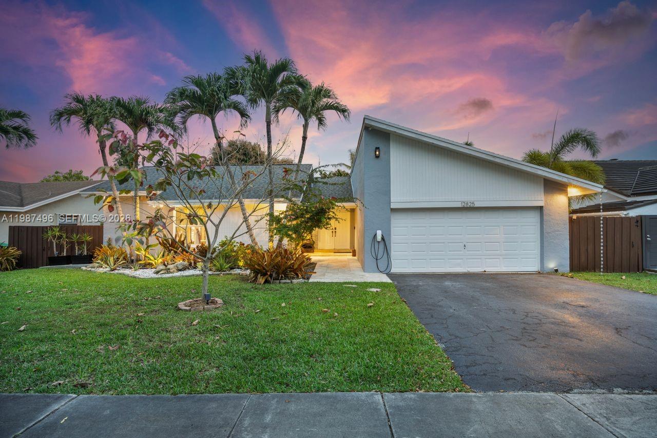 Very well maintained and move-in ready, this 3-bedroom, 2.5-bath home plus a versatile den/office offers comfort, flexibility, and a prime location with no HOA. The home features volume ceilings, laminate flooring throughout, and custom lighting, creating a bright and welcoming atmosphere. A new upscale German kitchen with Bosch appliances opens seamlessly to the main living areas, enhancing both functionality and design.The flexible den is ideal as a home office, gym, or playroom. Enjoy indoor-outdoor living with a covered patio equipped with ceiling fans, lighting, and TV setup—perfect for entertaining. The backyard is a private oasis featuring a jacuzzi, outdoor shower, and fruit trees including mango and avocado, with ample space to add a pool.Additional features include impact windows, security cameras, Ring alarm system, digital temperature control, and automated irrigation. Bathrooms have been tastefully updated, and the fenced yard with lush landscaping offers both privacy and charm.Conveniently located near top-rated schools, Costco, Publix, and major conveniences, this home delivers space, upgrades, and an unbeatable Kendall location.