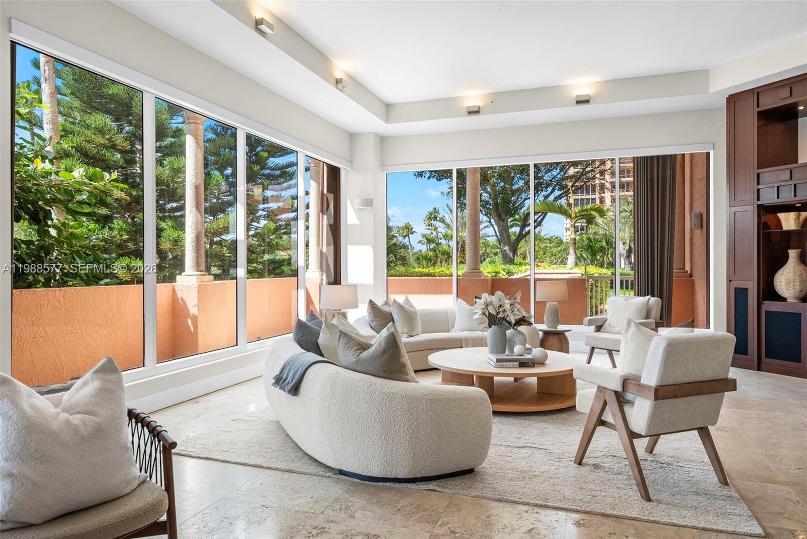 Nestled within the prestigious Gables Club, this exceptional Lanai South residence offers a rare blend of space, privacy, and effortless indoor-outdoor living in the heart of Coral Gables.This expansive 4-bedroom residence, complete with a dedicated staff room, is thoughtfully designed to provide both comfort and functionality. Generously sized bedrooms are filled with natural light, creating a bright and airy atmosphere throughout the home, while the well-designed layout offers both privacy and flexibility.Spacious balconies extend the living areas outdoors and connect directly to the lush garden grounds of Gables Club, creating a unique lanai-style experience. This seamless connection to greenery enhances the sense of tranquility and provides a true indoor-outdoor lifestyle rarely found in condominium living.The residence also benefits from the security and exclusivity of Gables Club, offering peace of mind while maintaining the warmth and feel of a private home. With its garden access, expansive layout, and house-like ambiance, this property delivers the best of both worlds—luxury condominium convenience with the comfort and privacy of a single-family residence.** The images has been digitally altered for virtual staging.