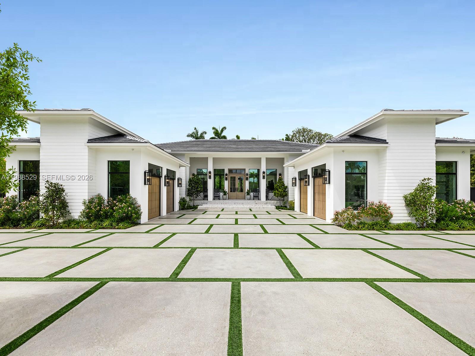Welcome to a newly constructed 2026 modern estate set along the iconic, tree-lined Old Cutler Road. Just moments from Pinecrest, this custom residence offers a rare combination of design, lifestyle, and location in one of the area’s most desirable residential corridors. The home features 6 bedrooms and 6 bathrooms, soaring ceilings, expansive open living spaces, custom millwork, a completely built-out mudroom, and designer lighting throughout. A chef’s kitchen anchors the home with premium Thermador appliances, custom cabinetry, Taj Mahal stone countertops, a hidden walk-in pantry, and a functional double-kitchen layout ideal for both entertaining and everyday living. Designed for seamless indoor-outdoor living, the property showcases a private resort-style backyard complete with a pool and water features, covered terrace with outdoor kitchen, gazebo, and multiple lounge areas. The grounds also feature a basketball court and beach volleyball court, creating a one-of-a-kind setting for recreation, entertaining, and family living. A rare opportunity to own a new construction estate near Pinecrest, offering privacy and immediate access to top schools, parks, and premier lifestyle amenities, including Miami Palmetto Senior High, Gulliver Preparatory School, and Westminster Christian School.