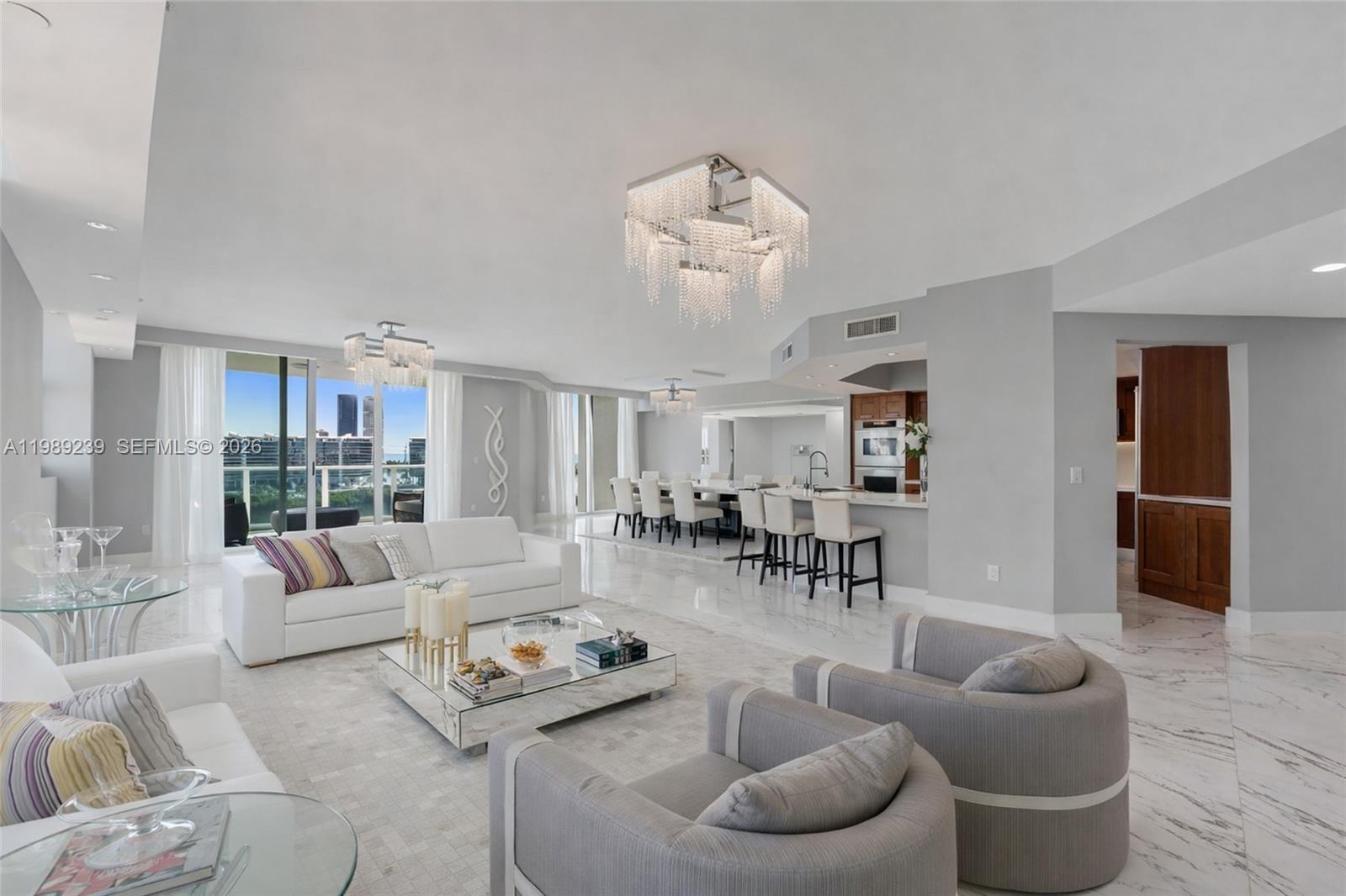 Premium corner residence at Peninsula II in Aventura, offering a true flow-through layout with breathtaking east Water views and captivating west-facing city and sunset vistas. This spacious 4-bedroom, 4.5-bath home is filled with natural light and terraces that frame the surrounding skyline and bay. Enjoy a Resort-style lifestyle with exceptional amenities including two pools, tennis courts, state-of-the-art fitness center, on-site juice bar, spa services, and full-service valet. A rare Opportunity to own a residence that seamlessly blends space, views, and Lifestyle.