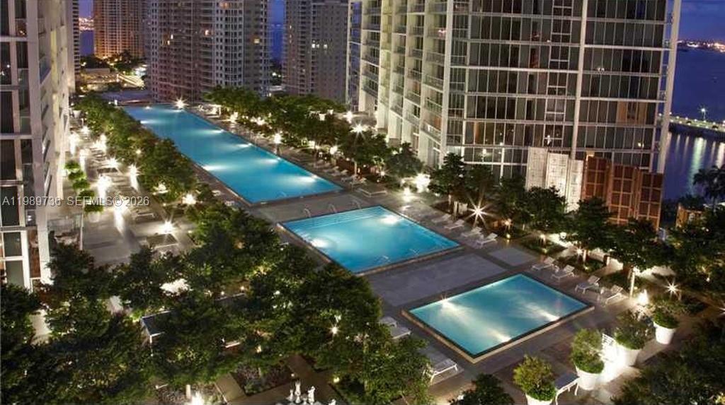ENCLAVED IN THE VIBRANT CORE OF BRICKELL! 1Bd / 1Bth BAY-FRONT RESIDENCE. OPEN LAYOUT. GENEROUS PRIVATE TERRACE. STUNNING BAY VIEWS. SUB-ZERO AND WOLF APPLIANCES. 1 DESIGNATED PARKING SPACE. ICONIC CONDO SURROUNDED BY TOP-TIER DINING, NIGHTLIFE, AND LUXURY. STEPS FROM Brickell City Centre. CLOSE TO MAJOR HIGHWAYS, BEACHES, AND MIAMI INTERNATIONAL AIRPORT. WORLD-CLASS AMENITIES. EXPANSIVE WATERFRONT POOL DECK, 3 POOLS, SAUNA, MOVIE THEATER, BILLIARD ROOM, FULL-SERVICE SPA, MODERN FITNESS FACILITY, 24 hrs CONCIERGE. ON-SITE RESTAURANTS.