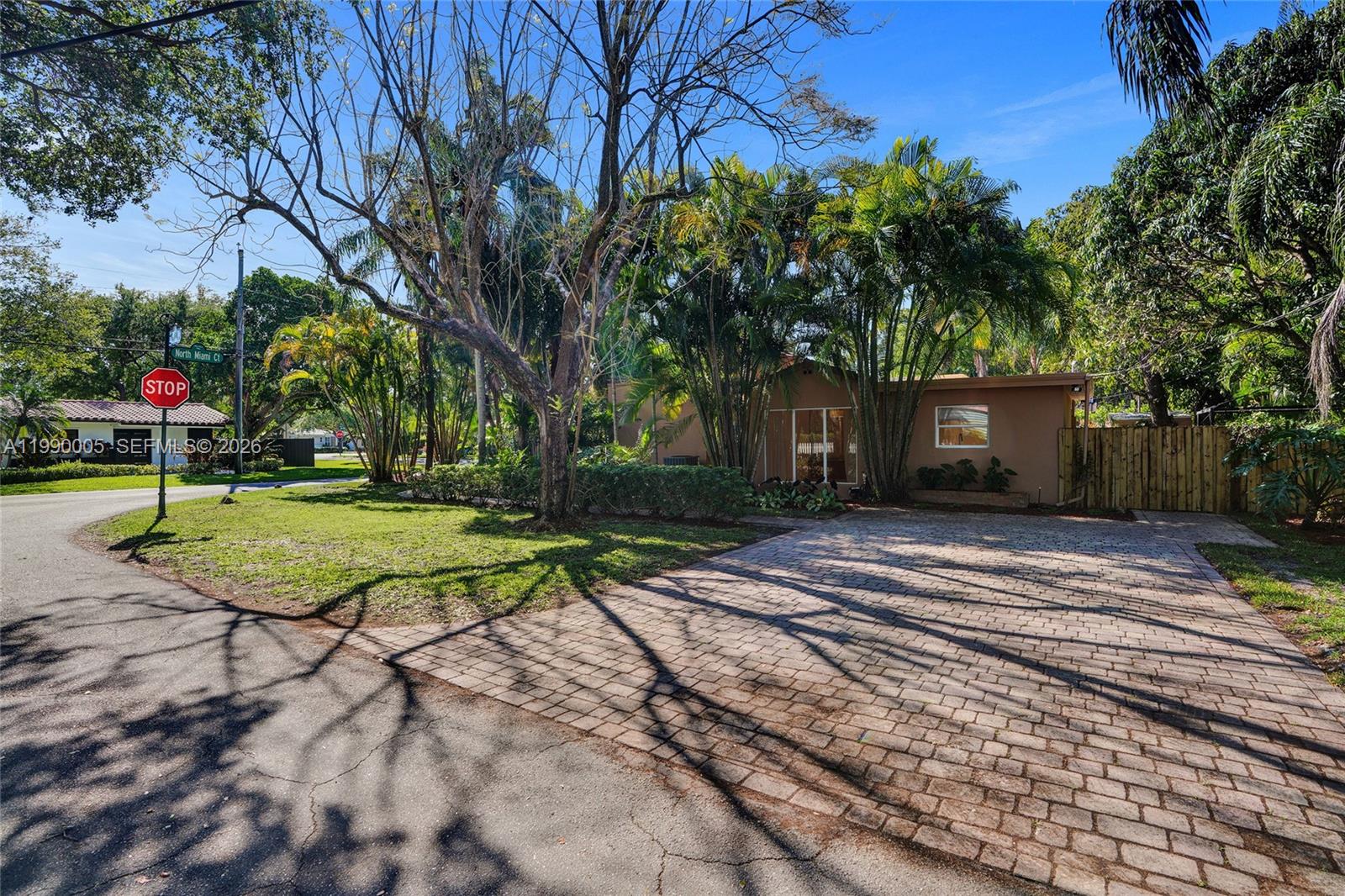 Well-appointed guest bedroom at 20 101st St - Home in Miami Shores