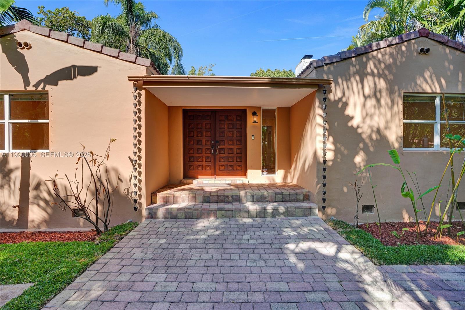 Open-concept living area at 20 101st St - Home in Miami Shores
