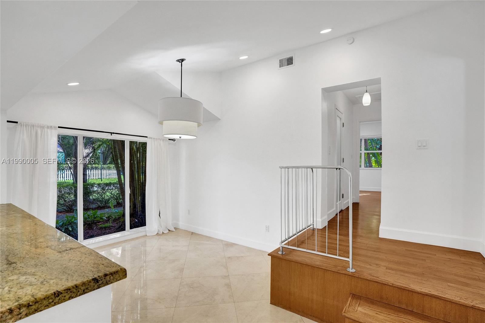 Open-concept living area at 20 101st St - Home in Miami Shores