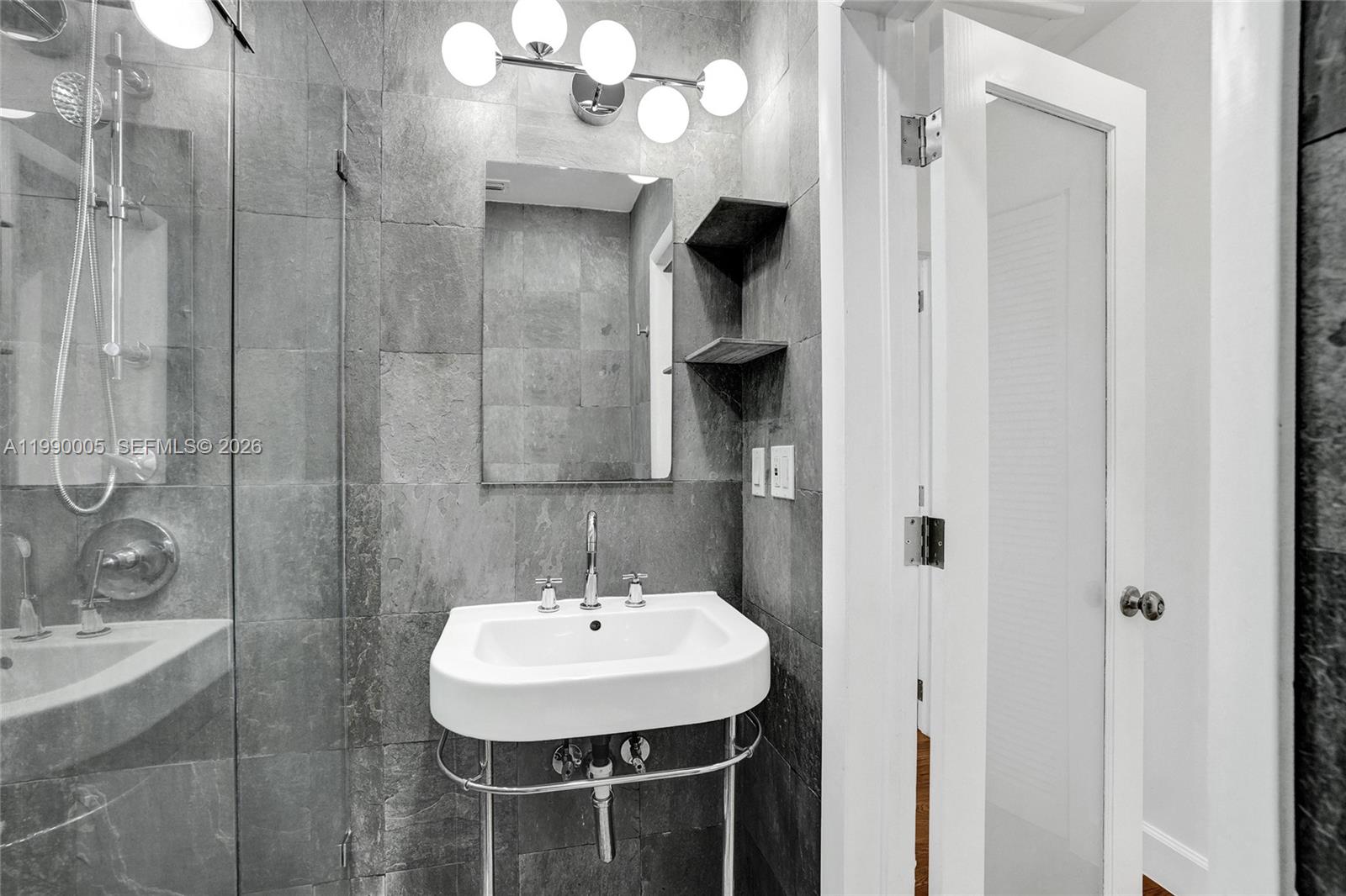 Designer master bathroom at 20 101st St - Home in Miami Shores