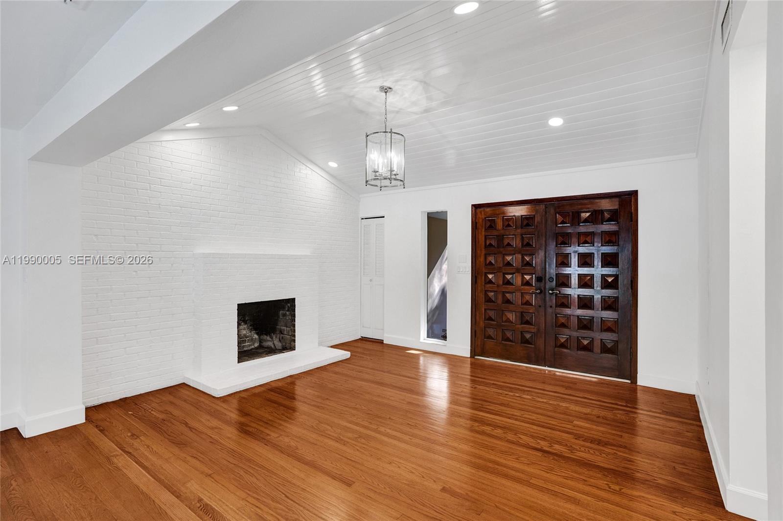Open-concept living area at 20 101st St - Home in Miami Shores