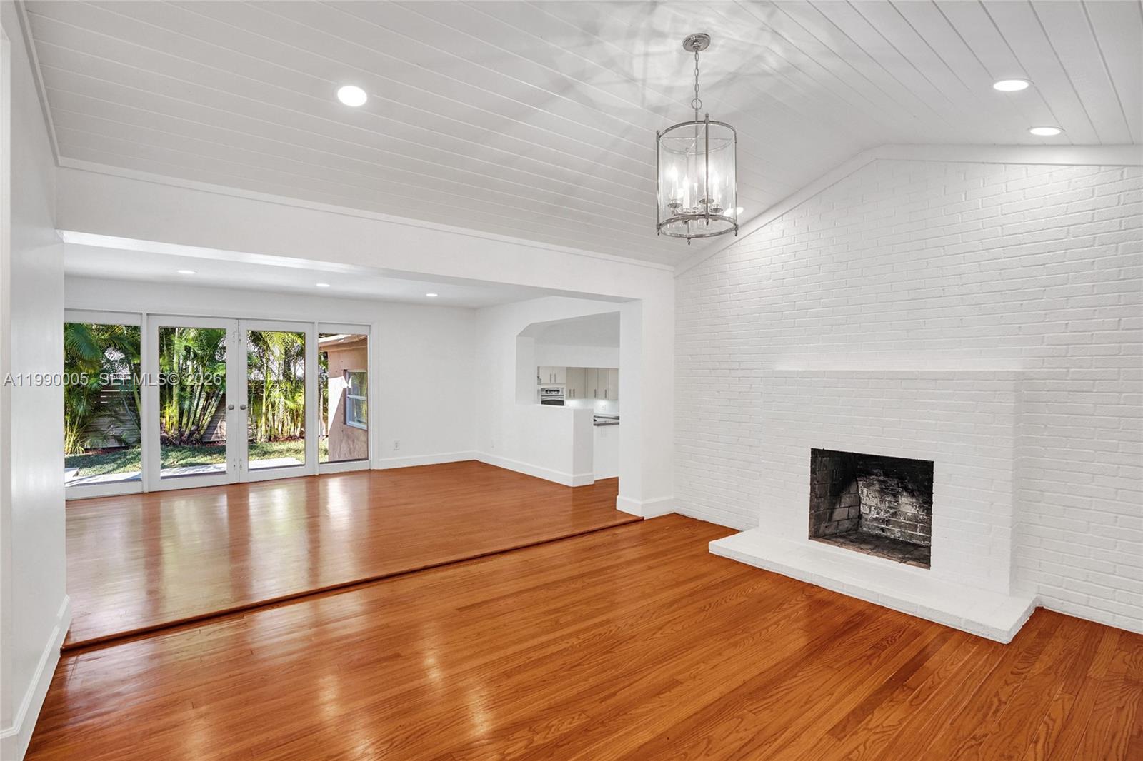 Modern kitchen with designer features at 20 101st St - Home in Miami Shores