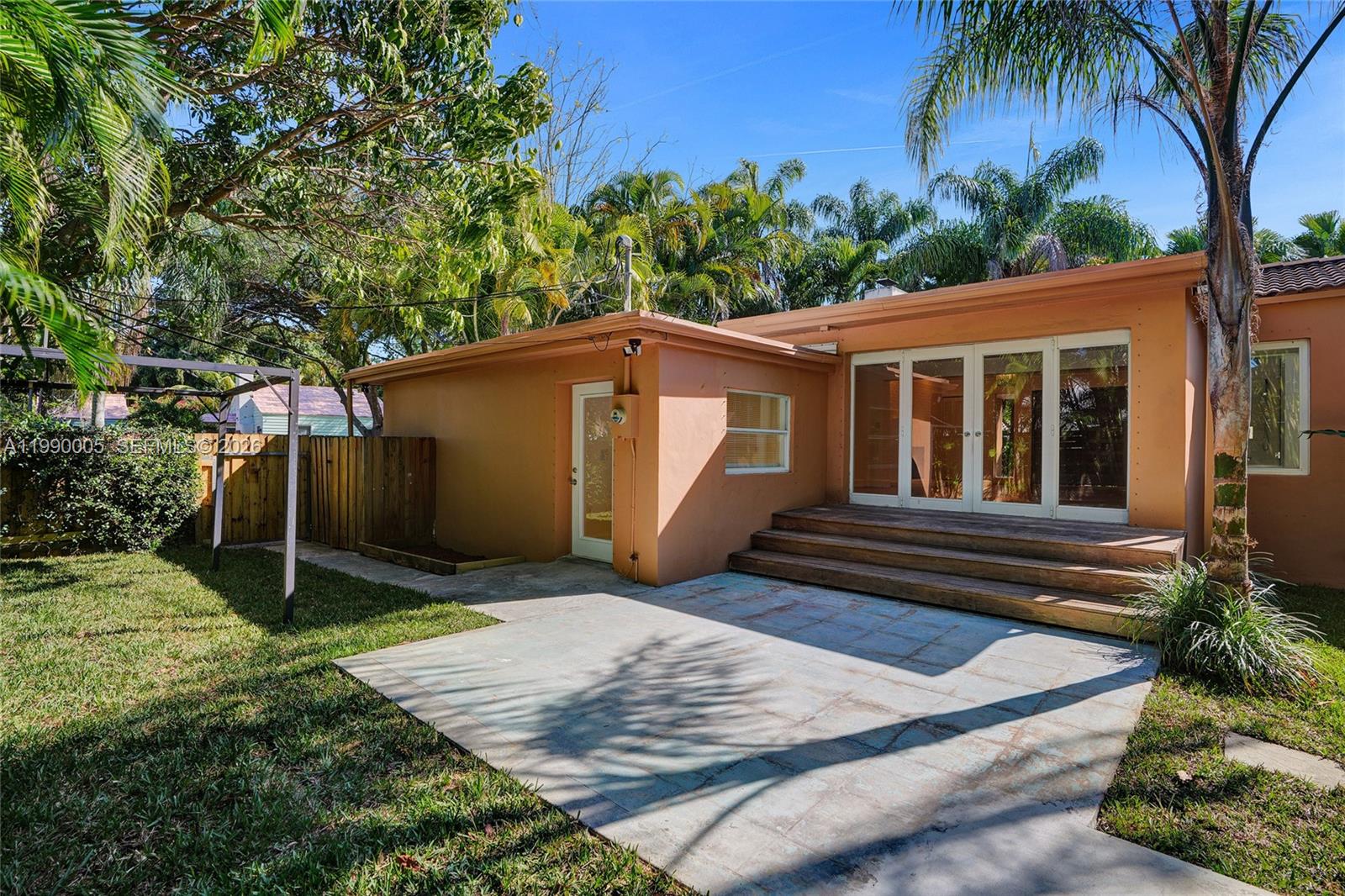 Elegant master bedroom retreat at 20 101st St - Home in Miami Shores