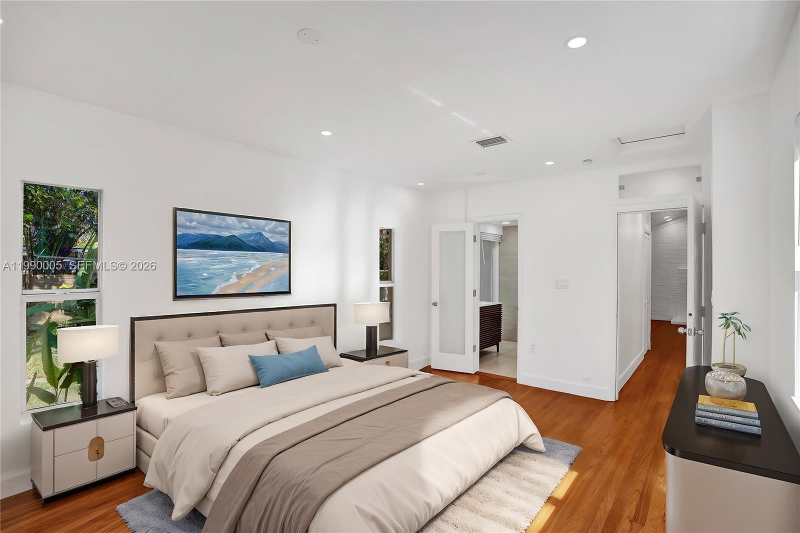 Well-appointed guest bedroom at 20 101st St - Home in Miami Shores