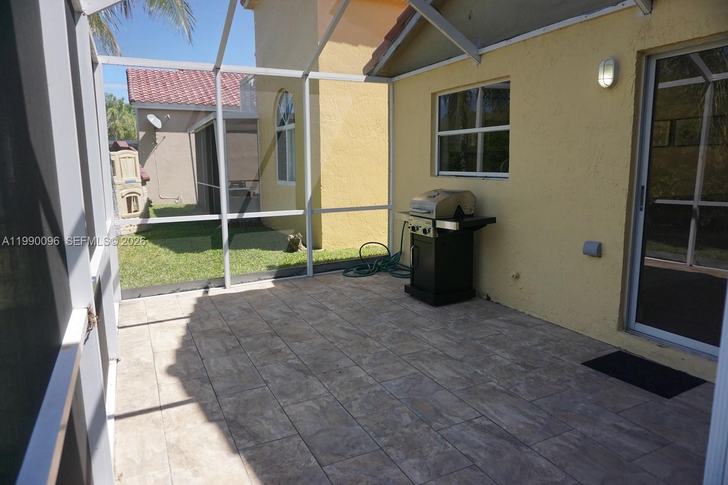 Well-appointed guest bedroom at 1057 6th Ave - Home in Dania Beach