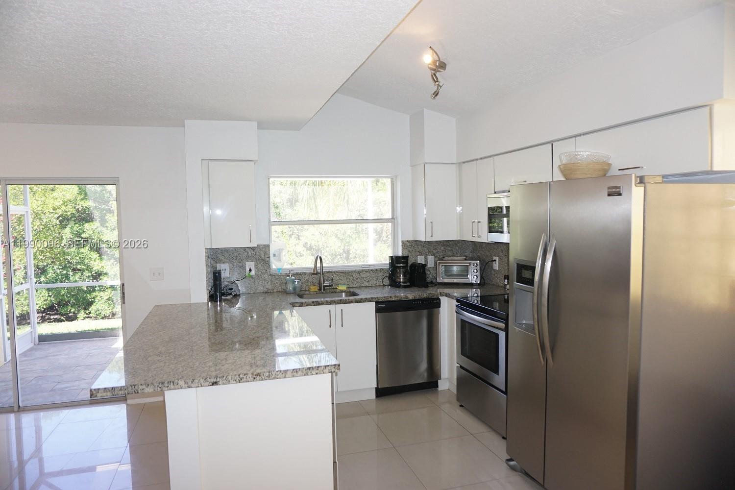 Elegant master bedroom retreat at 1057 6th Ave - Home in Dania Beach