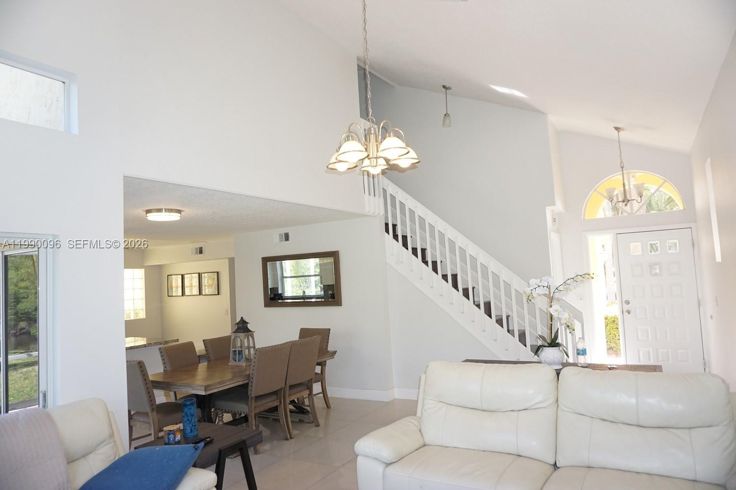 Well-appointed guest bedroom at 1057 6th Ave - Home in Dania Beach