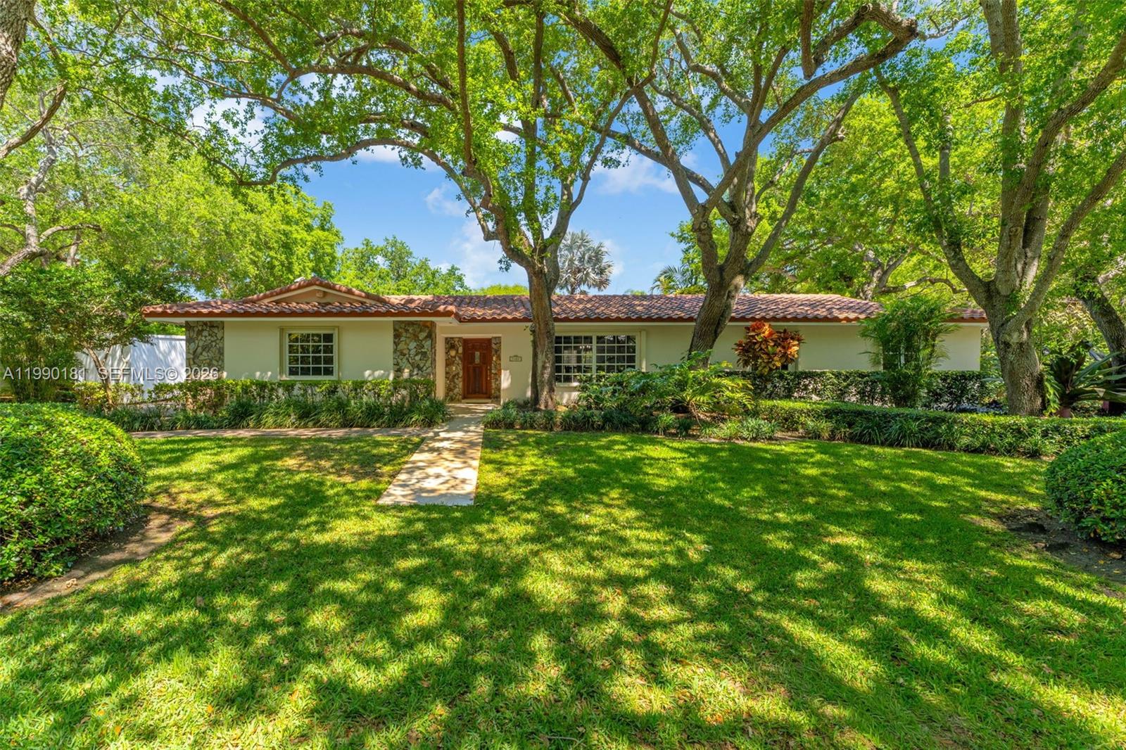 Beautifully maintained corner home located in the sought-after Hillary Estates area of Palmetto Bay. Owned and cared for by the same owners for the past 43 years, this property reflects pride of ownership and thoughtful updates throughout. The home offers 3 bedrooms and 2 bathrooms with 1,952 sq ft of living area and 2,848 sq ft total.Interior features include tile flooring throughout and an updated, well-kept living space designed for comfortable everyday living. Major improvements include a 2014 roof, 2026 A/C, new water heater, new water softener and lined waste lines with a 50-year warranty for added peace of mind. The property also includes a second septic system, offering potential flexibility for future expansion (buyer to verify).Enjoy the South Florida lifestyle in the private backyard featuring a pool and a tiki hut—perfect for outdoor entertaining and relaxation. Full accordion shutters provide convenient storm protection.Ideally located near parks, walking trails, and coastal recreation, and just minutes from Palmer Trinity, Westminster, Gulliver Prep, and Palmetto High School. An opportunity to own a well-maintained property in a highly desirable area.
