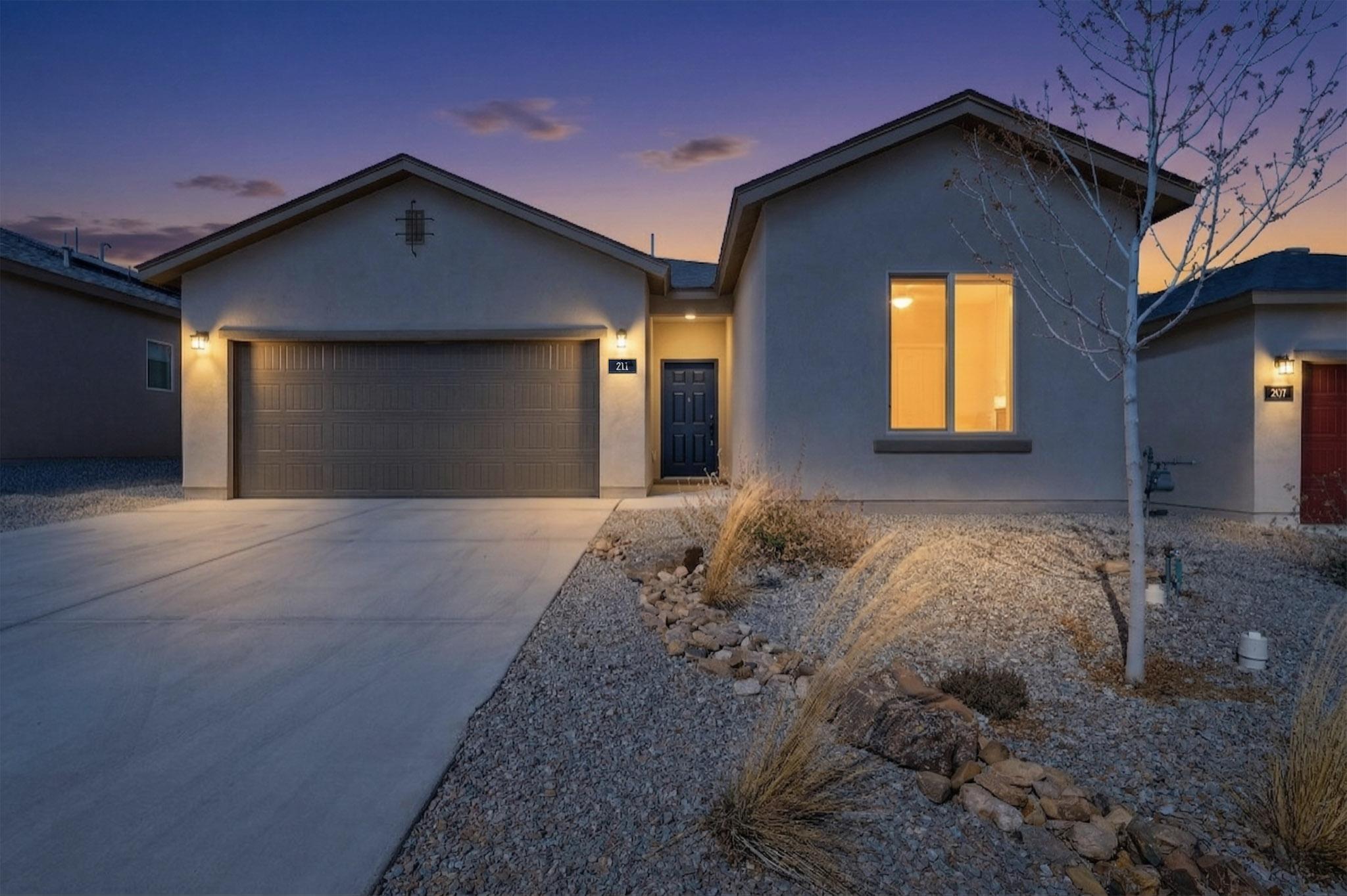 Welcome to this like-new home in Rio Rancho! This less-than-one-year-old 1,588 SF 3BR/2BA home offers a bright, open floorplan designed for modern living. The kitchen features a large island, abundant counter space, and an oversized pantry, all flowing seamlessly into the living and dining areas--perfect for entertaining. The spacious primary suite includes a walk-in shower and large walk-in closet. Enjoy year-round comfort with refrigerated air and efficiency with a tankless water heater. A generous laundry room adds convenience, while two additional bedrooms offer flexibility for guests, office, or hobbies. 4.5% VA assumable loan available for VA qualified buyers!