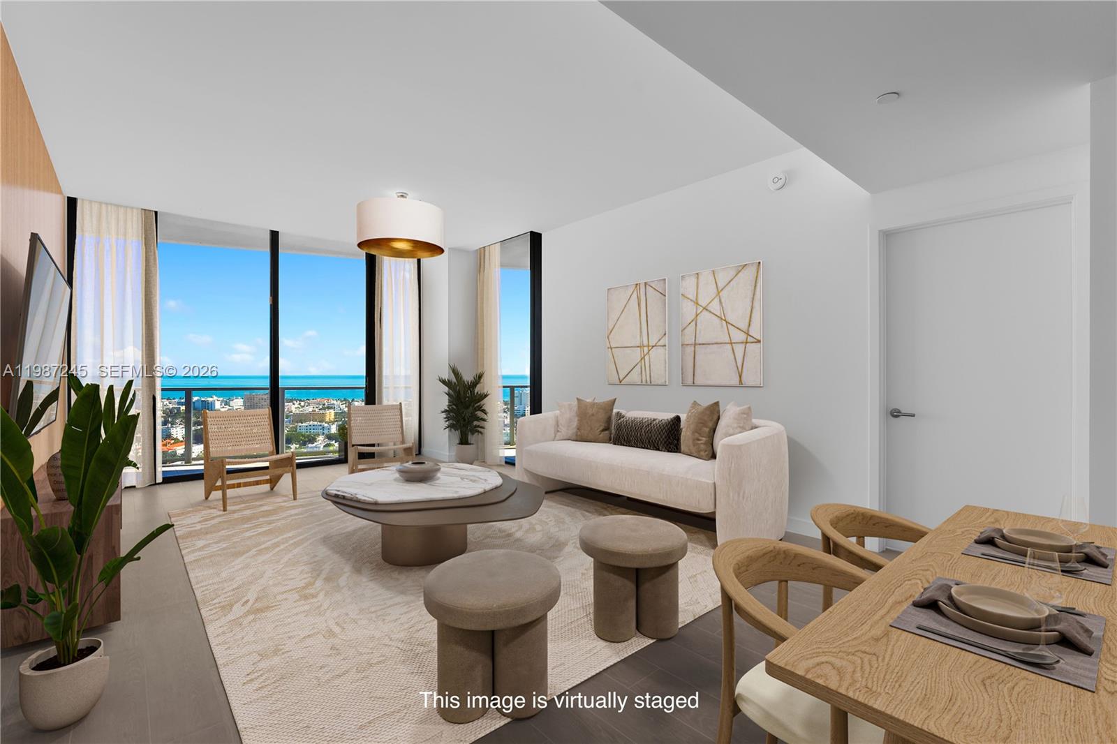 Experience the pinnacle of waterfront luxury at Five Park Miami Beach, the newest icon in Miami Beach. Be the first to live in this exceptional 2BR, 2.5BA residence spanning approximately 1400 SF. This unit is uniquely equipped with a custom kitchen island with quartzite waterfall that none of the other 02 line units have. The unit has easy-to-maintain wood-pattern porcelain flooring in the interior and exterior-grade tile on the balcony. Enjoy breathtaking sunrise & ocean views from floor-to-ceiling glass windows. The elegant interior boasts Gaggenau appliances and quartzite countertops, blending sophistication with comfort. Five Park delivers an unmatched lifestyle with a full-service beach club, in-residence dining, resident-only on-site restaurant curated by James Beard Award-winning Chef Michelle Bernstein, two lavish pools, hot tub, state of the art spa, fitness center, butler service, two house cars, and more. Walk across the soon-to-be-completed Canopy bridge by renowned French conceptual artist Daniel Buren and step directly into South of Fifth's shops, restaurants, and a marina to dock your boat or be picked up for a charter. Nestled beside Canopy Park—a lush 3-acre retreat—this pet-friendly residence seamlessly fuses nature and luxury for the ultimate Miami Beach sanctuary. Owner may lease for minimum of 6 months 2x per year. Unit is pre-wired for automated window treatments with shade pockets already installed. New owner to customize closets post-closing.