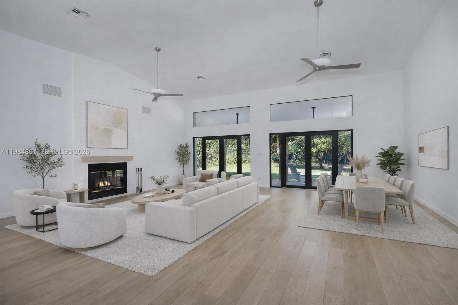 A Rare Offering in the Heart of Pinecrest! Beautifully renovated four-bedroom residence defined by volume, light, and understated elegance. Vaulted ceilings and a wood-burning fireplace create a warm architectural focal point, while a newly designed kitchen and refined bathrooms bring a clean, modern finish throughout. The home extends to a covered terrace and an expansive, private backyard — notably free of outdated pools or structures — presenting a rare opportunity to create a fully customized outdoor retreat without compromise. Positioned on a quiet, no-traffic street, the setting offers both discretion and prestige. Zoned for top-rated schools and move-in ready, this property balances immediate comfort with exceptional future potential.