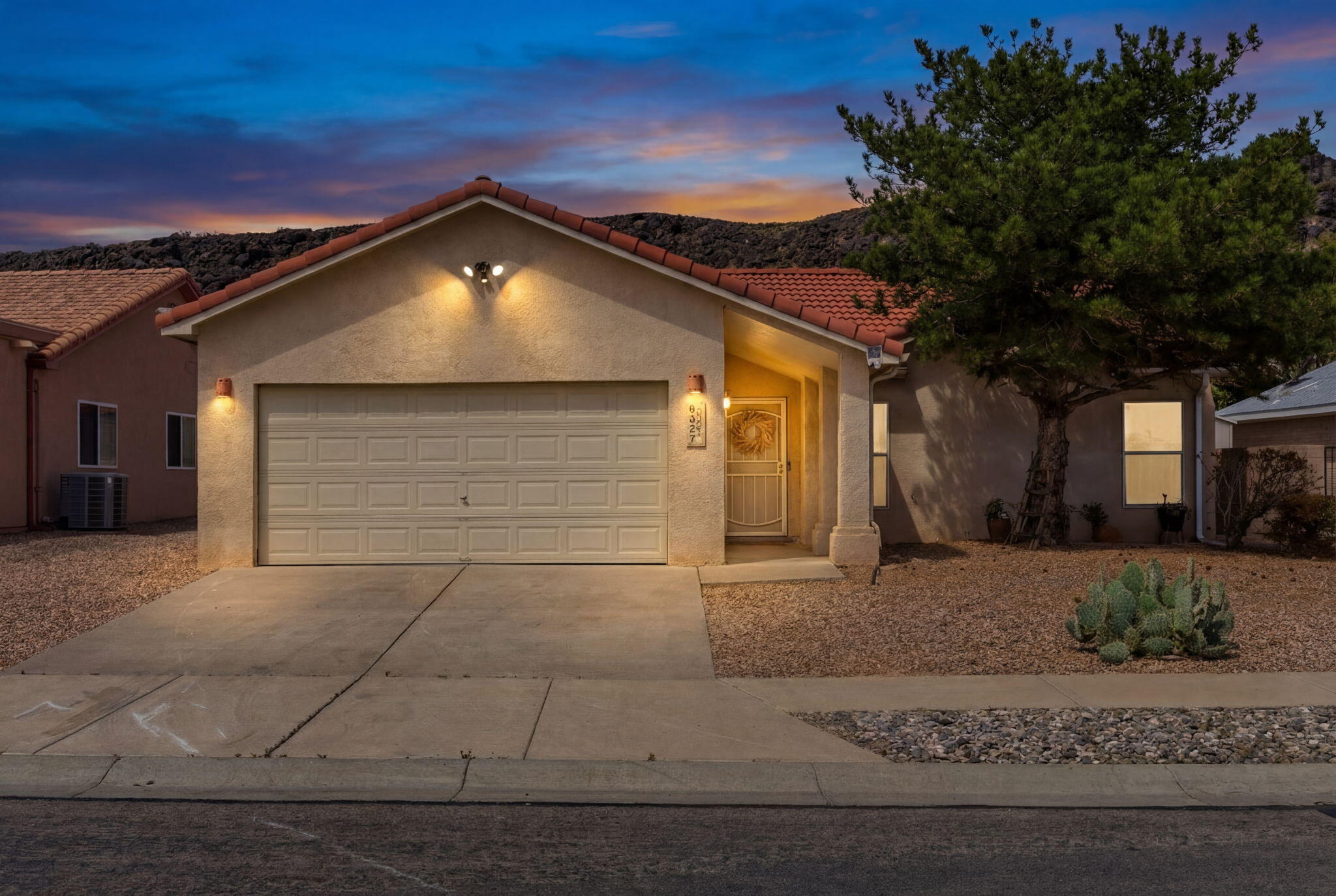 Honey....STOP the Car!  Located in the desirable Las Marcadas neighborhood, this single-story home offers a functional layout with high ceilings & thoughtful architectural details throughout. The galley-style kitchen features abundant cabinet space, a pantry & easy access to the backyard--perfect for everyday living & entertaining. Open living and dining areas with a gas fireplace creates a comfortable flow for gatherings. The spacious primary suite includes a large en suite with dual sinks and a walk-in closet. Enjoy added privacy with the home backing to Petroglyph/Las Marcadas open space. Additional features include refrigerated A/C, a tile roof, and a generously sized backyard. Conveniently located near shopping, dining, and everyday amenities.  Schedule your showing today!