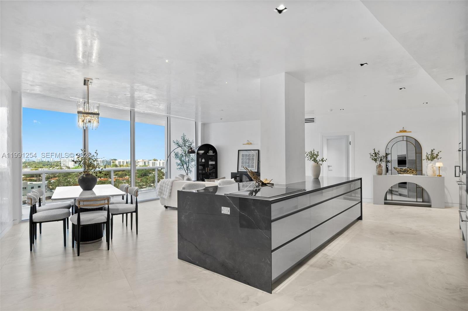 Completely renovated 3-bedroom, 3.5-bath residence at the prestigious Majestic Tower in Bal Harbour, offering 2,250 SF of modern luxury. This turnkey unit features a bright open layout with floor-to-ceiling windows, spacious living and dining areas, and a wraparound balcony showcasing beautiful open views.Sleek chef’s kitchen with custom cabinetry, premium appliances, and oversized island. Wide-plank flooring and high-end finishes throughout.Opportunities like this are rare—contact us today to schedule your private showing.