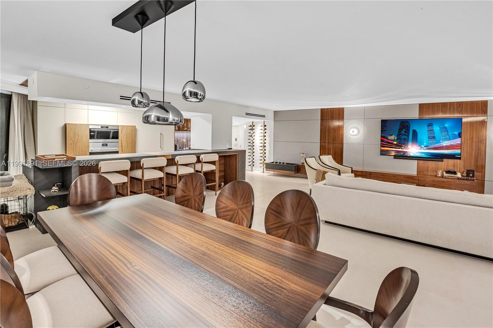 Fully renovated 3BR/3BA oceanfront residence at Oceania III, over 2400 SQFT, located in the heart of Sunny Isles Beach — one of South Florida’s most desirable coastal destinations.Designed by DANG Architecture, this turnkey home features modern European elegance, premium craftsmanship, and smart-home integration.A true standout is the rare ~1,000 sq ft private terrace with direct ocean views — an exceptional outdoor living space almost never available in condominium residences. Perfect for entertaining, dining, or enjoying the ocean in complete privacy.The residence has been completely rebuilt with new electrical, plumbing, and A/C system with hotel-grade aroma feature. The chef’s kitchen includes Wolf appliances, induction cooktop, convection & steam ovens, integrated refrigerator/freezer, wine & beverage coolers, and custom cabinetry.Interior features include 48” slate tile flooring, custom closets, designer vanities, automated window treatments, washer/dryer, and fully furnished custom interiors.Offers the feel of a private beachfront home in prime Sunny Isles location.Strong appeal for buyers seeking outdoor space + privacy + oceanfront living+terrace — rare combination in Sunny Isles Beach